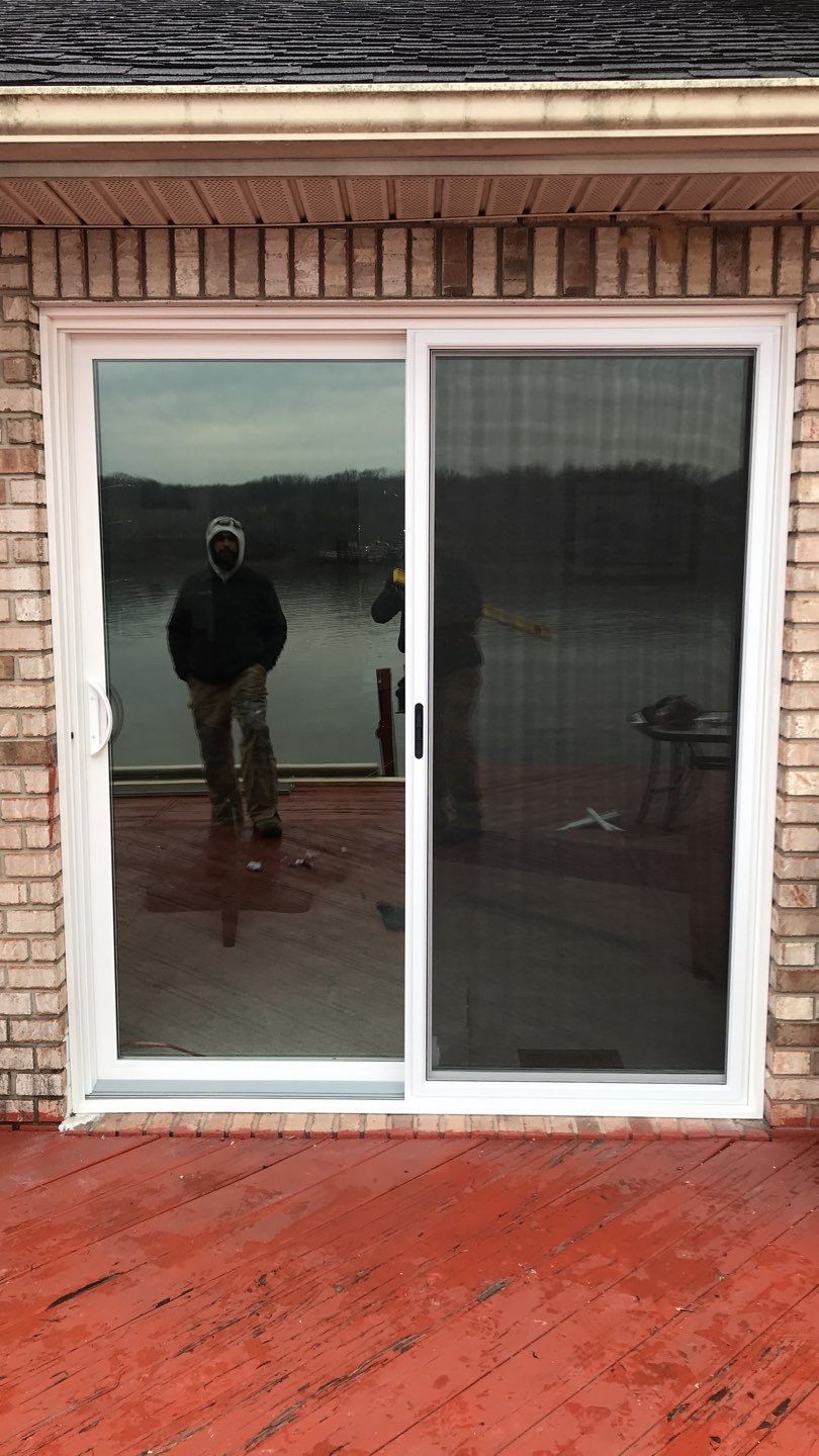 Deck Refurbush and Door Replacement using Trex Decking and Railing. Polaris Patio Doors by Secure Construction Company Inc