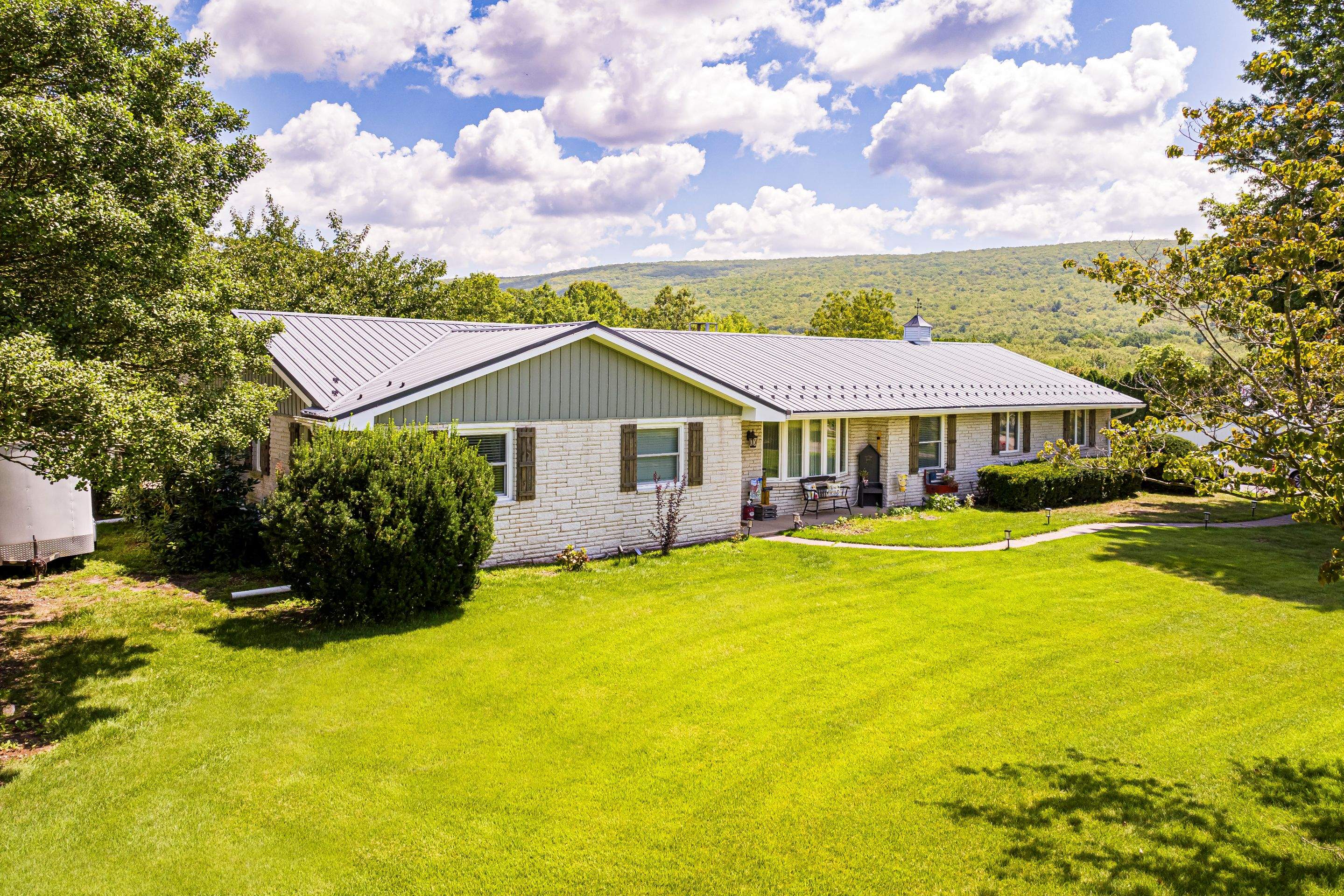 Metal Roof, Soffit and Fascia and siding by Esh Builders