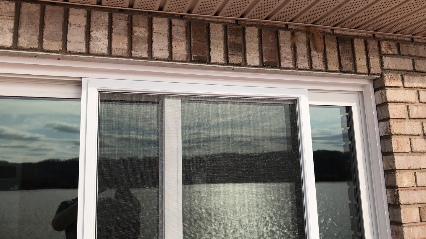 Deck Refurbush and Door Replacement using Trex Decking and Railing.  Polaris Patio Doors by Secure Construction Company Inc