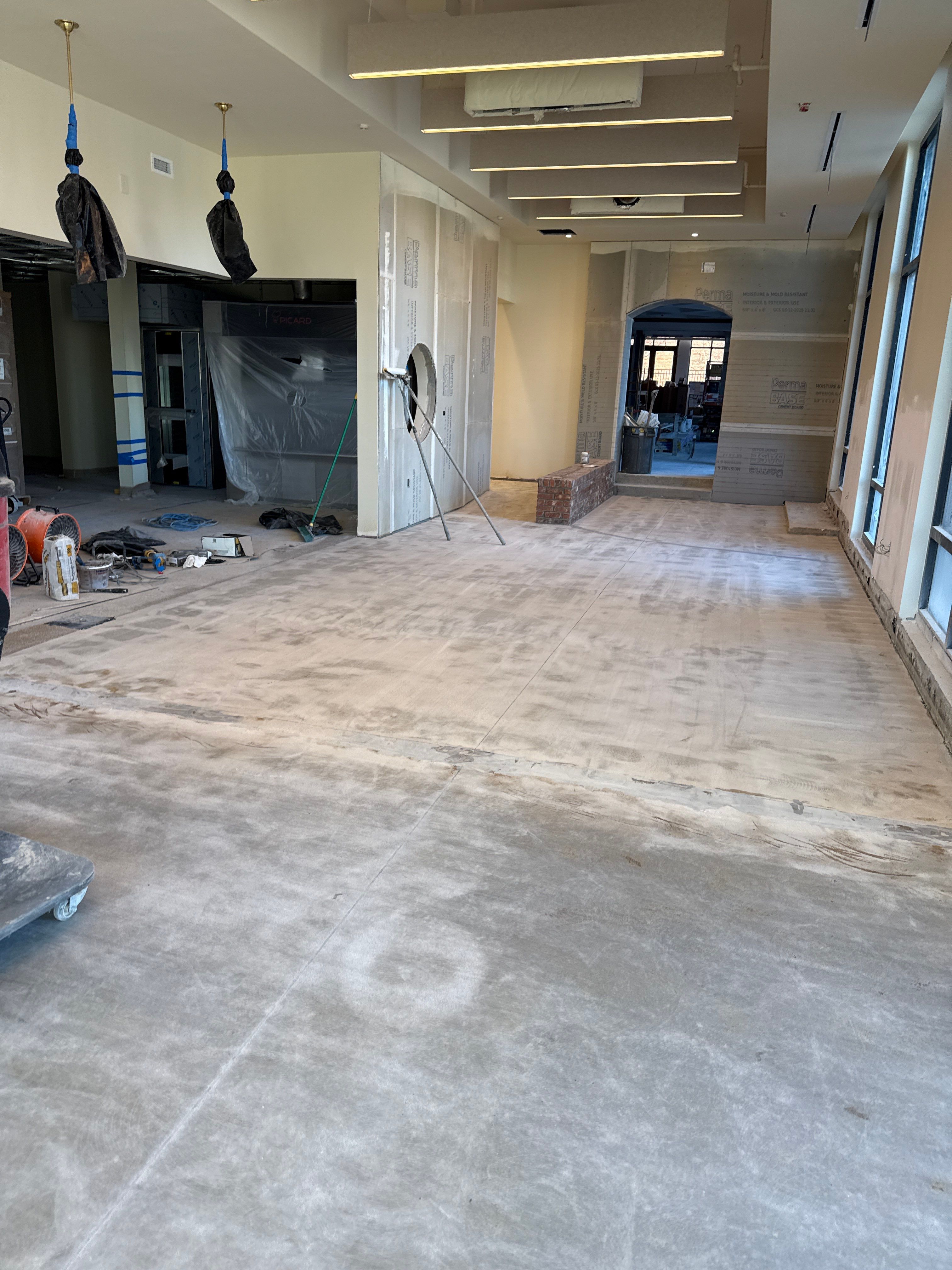 Industrial Epoxy Flake and Concrete Overlay Floor Installation in Pensacola by Cornerstone Hard Surface Restoration
