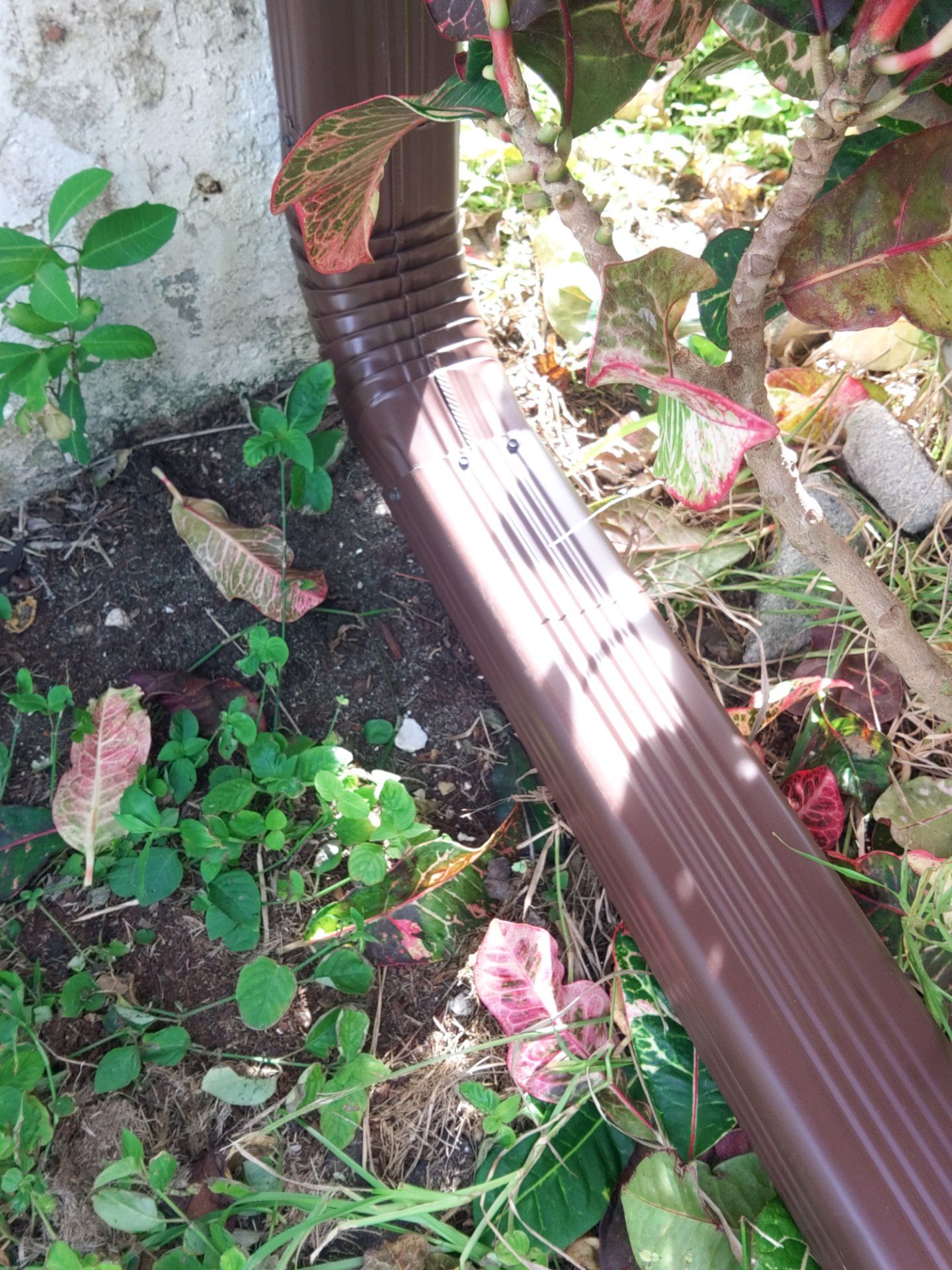 Brown Gutters in Cape Coral FL by Gutter Professors