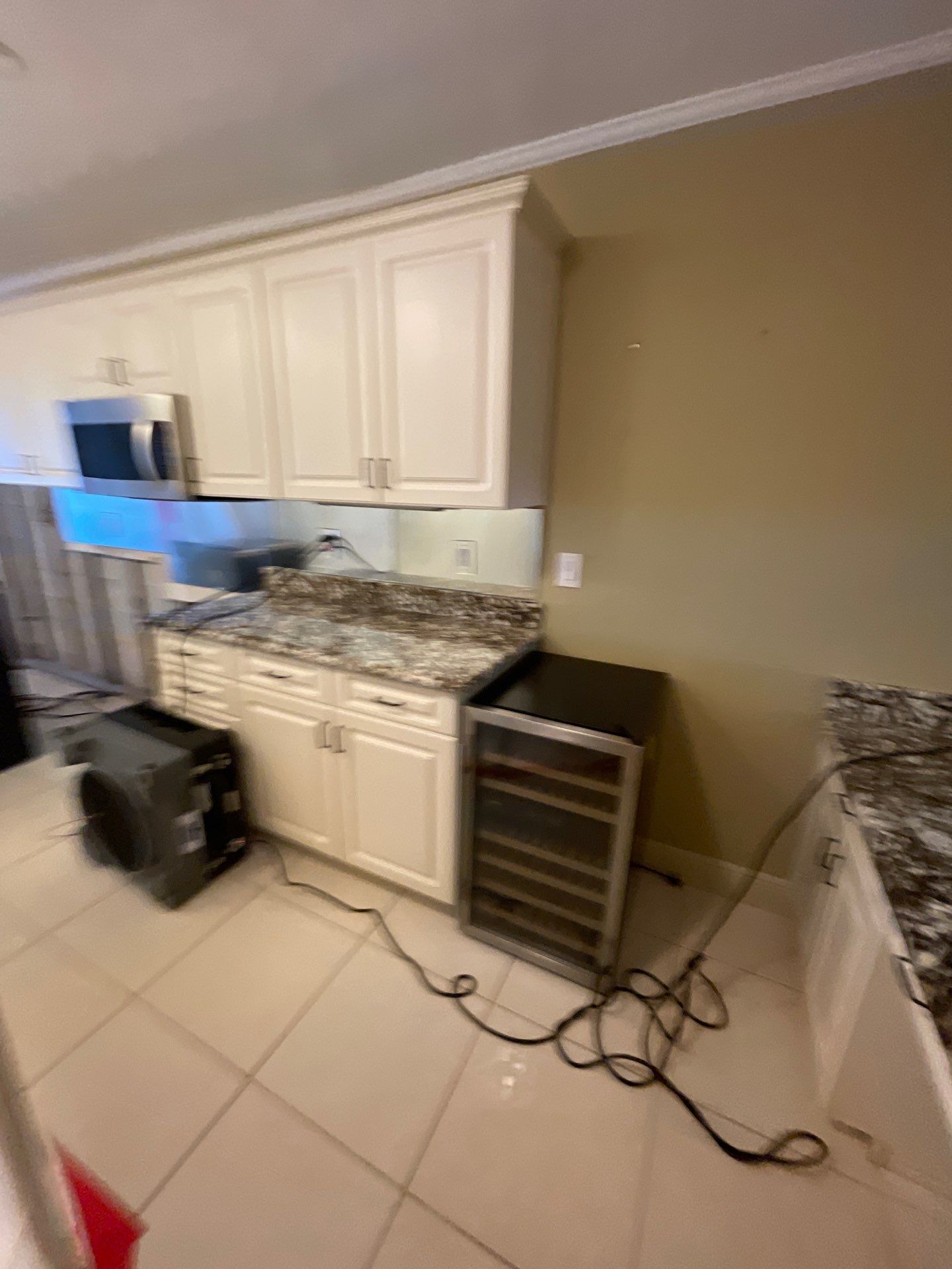 Mold remediation and rebuild of kitchen and living areas by Bay Coast Restoration 