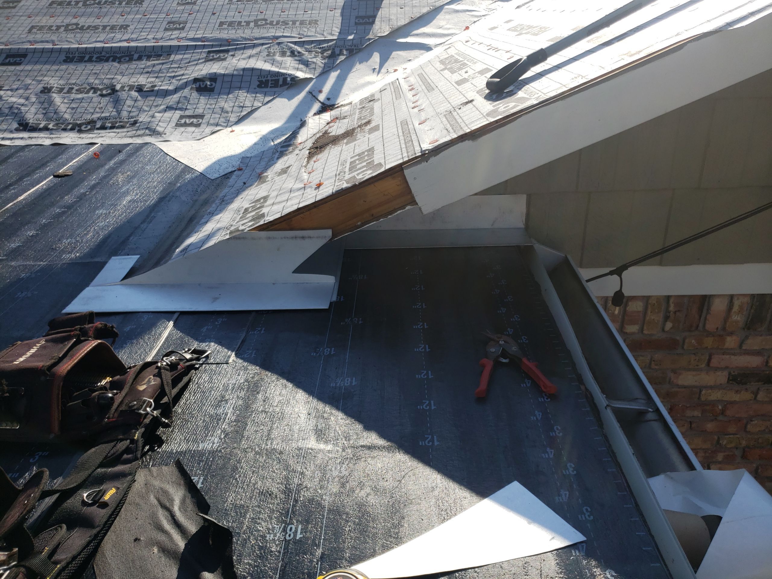 Residential Roofing Installation using Roof Replacement by American Roofing & Construction LLC