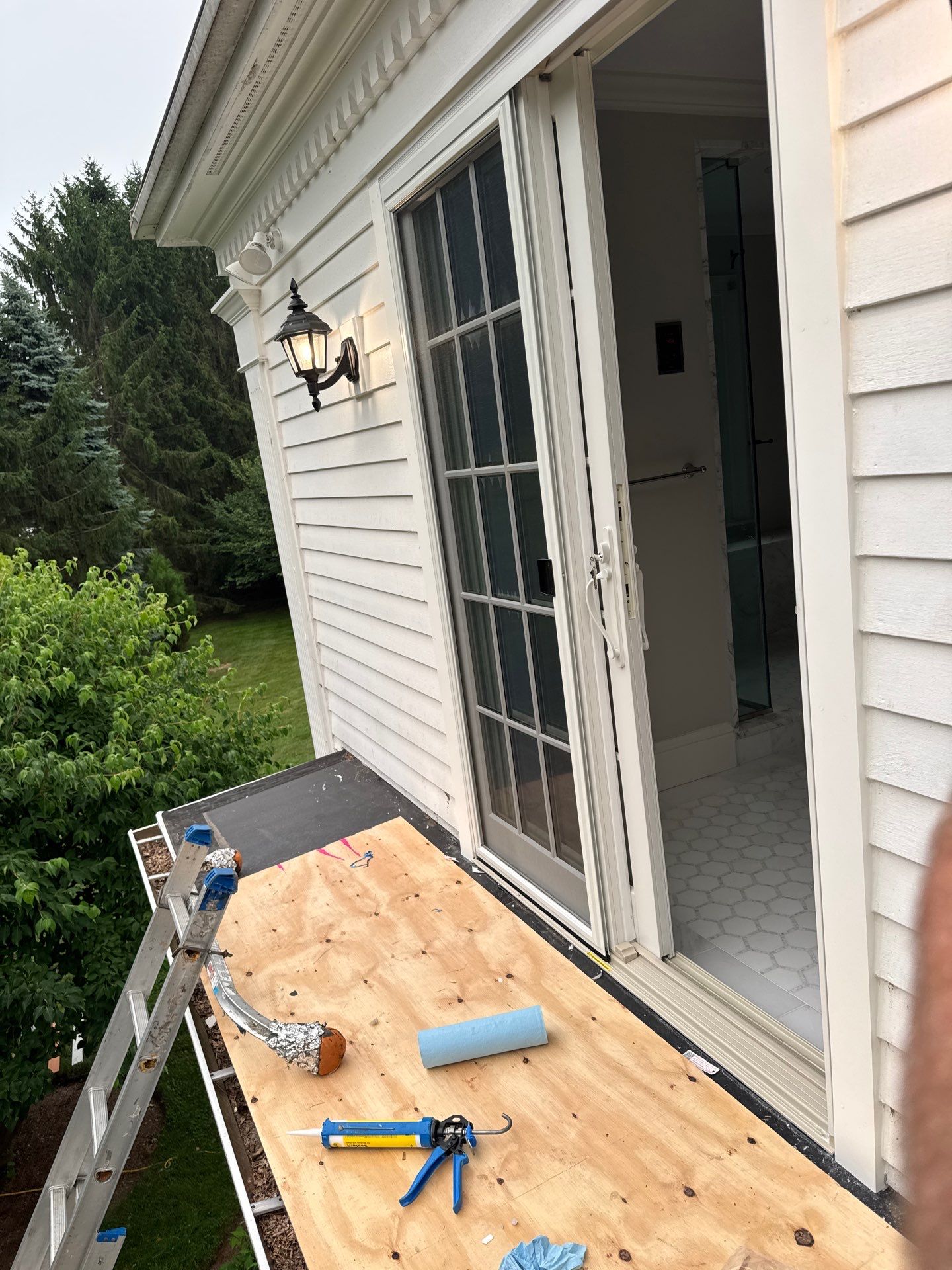 Patio Door Installation Using Infinity by Marvin Patio Door by DiGiorgi Roofing and Siding Inc