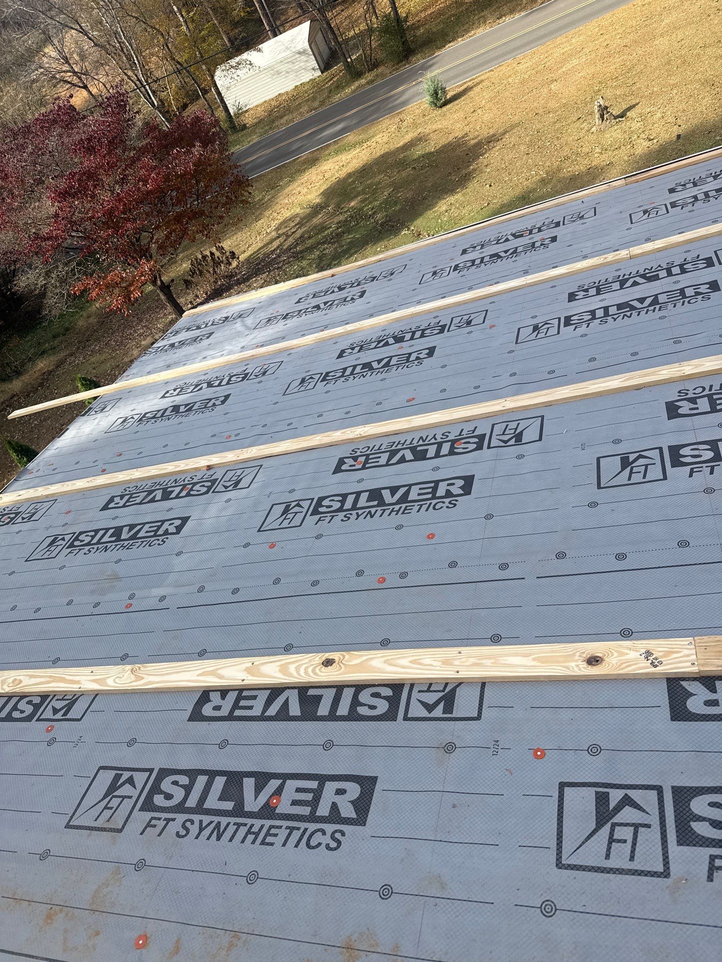 Roof Replacement in Pinson (Metal Roof) by The Roofing Dudes