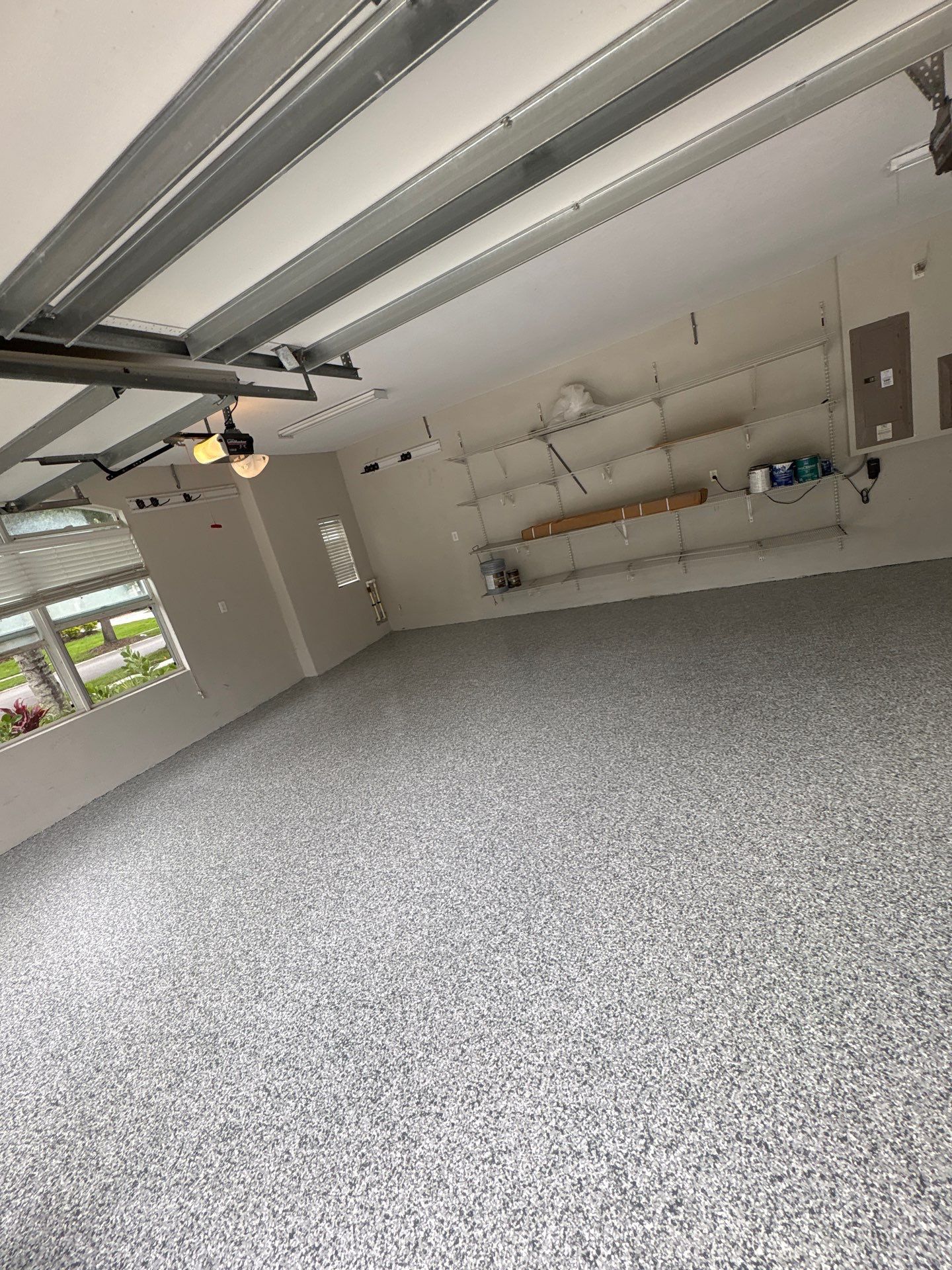 Tampa 2-Car Garage Transformation by Performance Floors & Coating