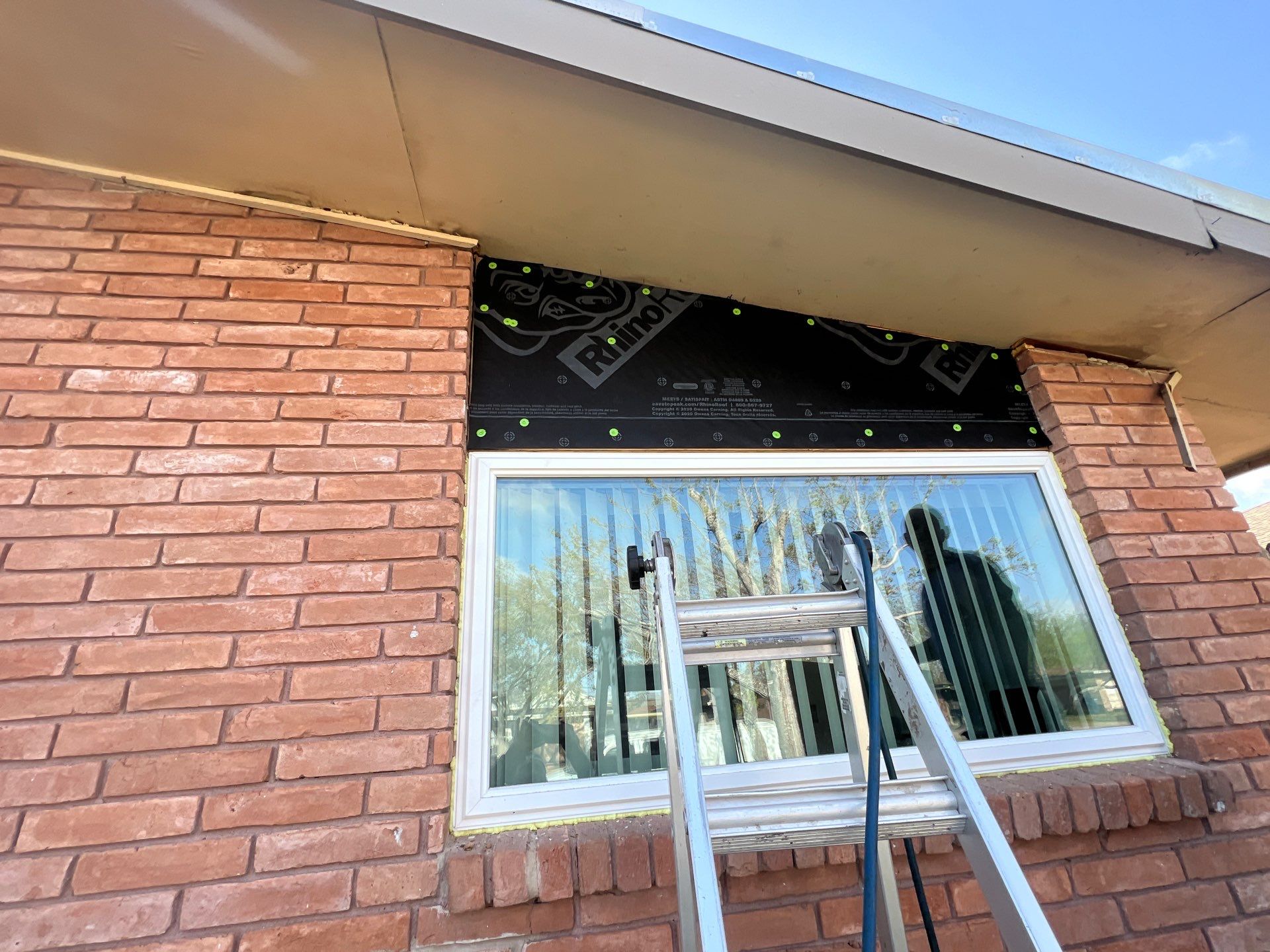 Windows in Brick with a Bay Window by Bayfront Roofing and Construction