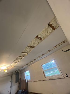 Garage ceiling using open cell spray foam