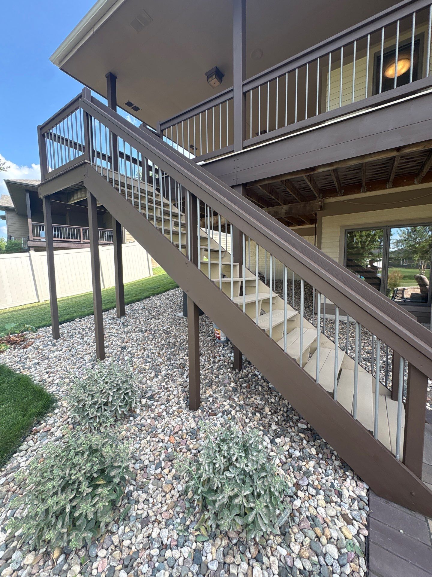 Sioux Falls Exterior Refresh and Multi-Level Deck Maintenance by Select Painting, Coatings & Garage Cabinets