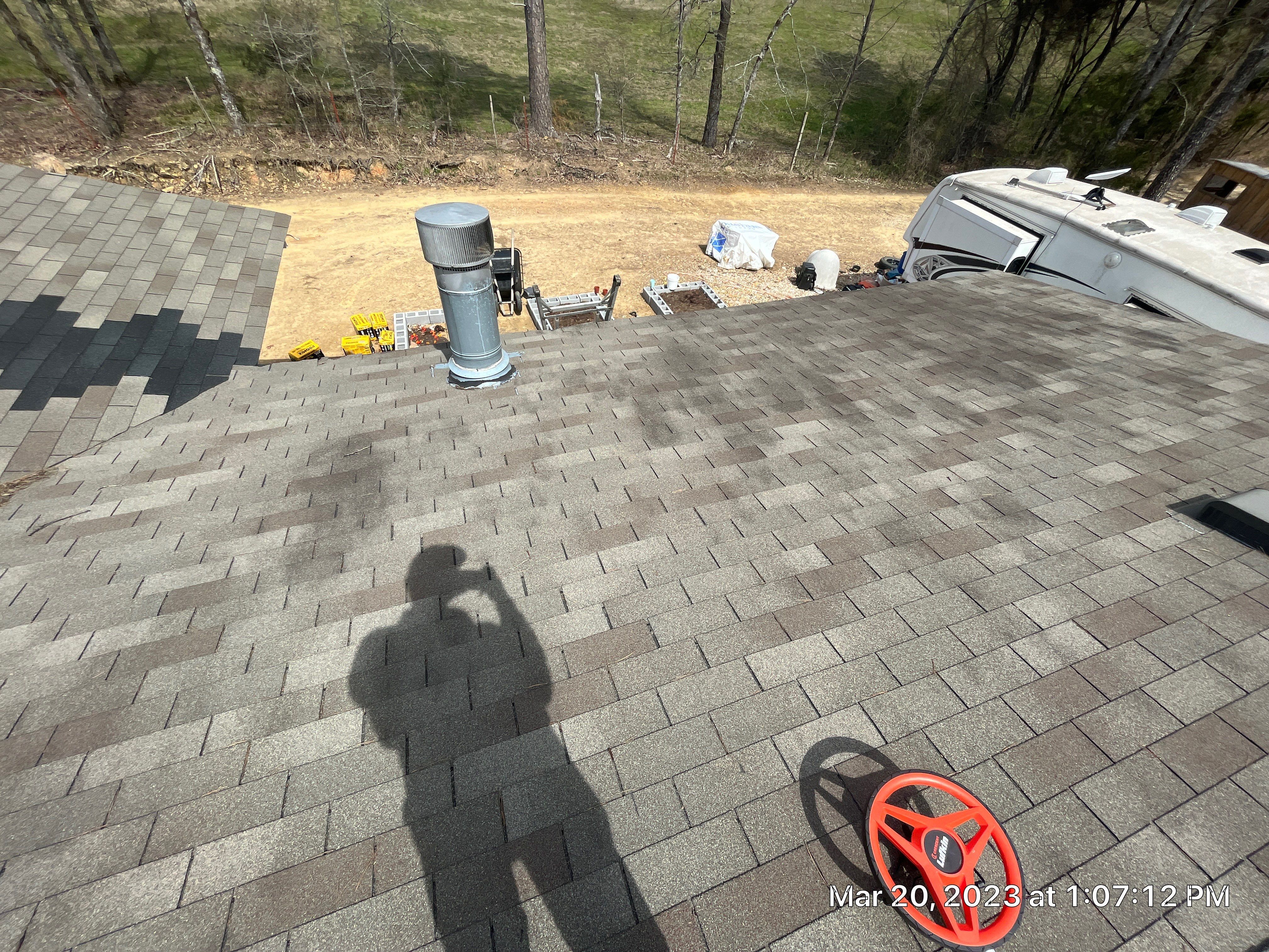 Residential Roofing Installation using 26 Gauge Colored Panels by Hostetler Roofing