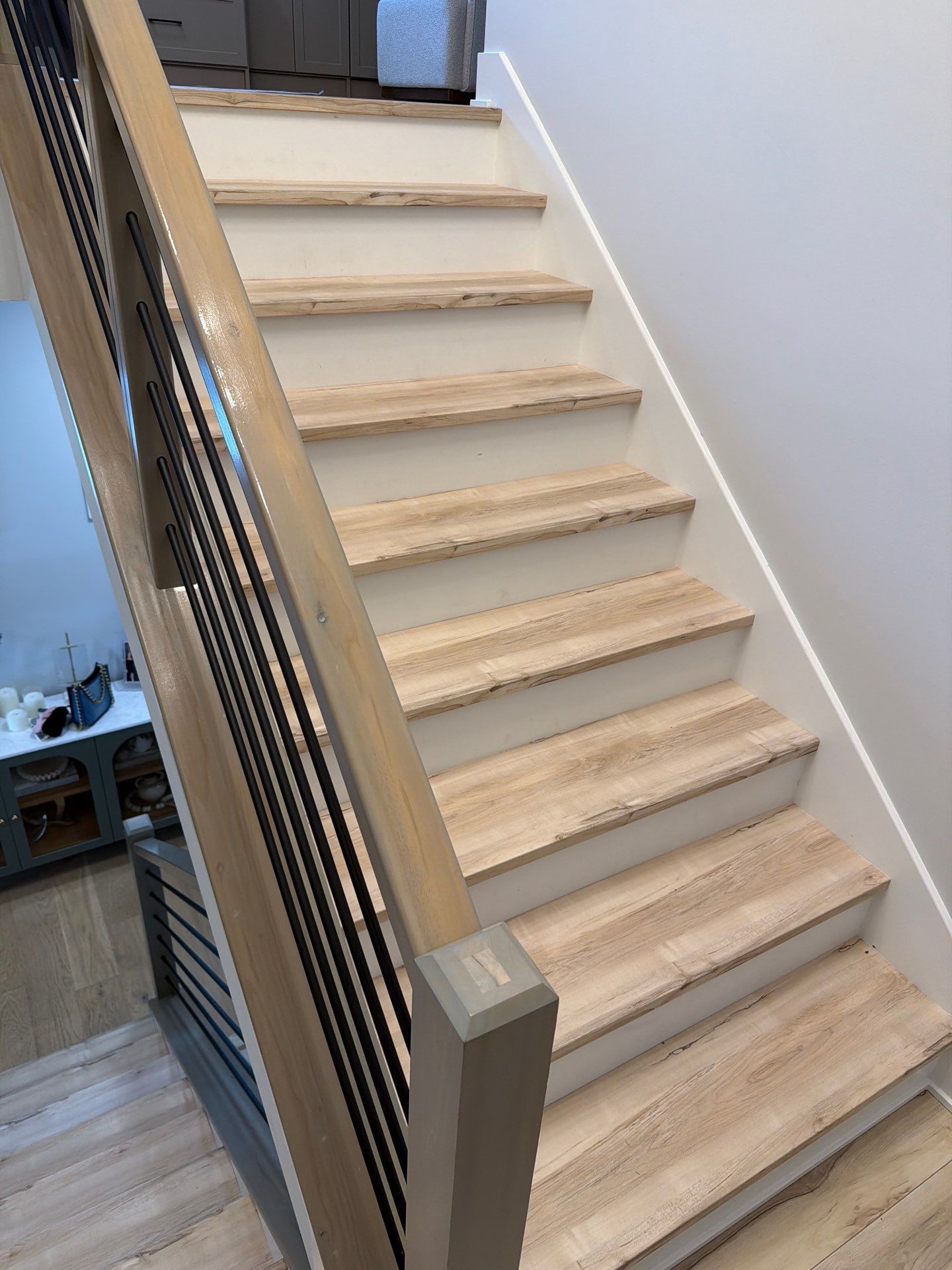 Fishers Staircase Renovation Featuring Custom Herringbone Runner and Modern Railing by Brothers Floor Covering INC.