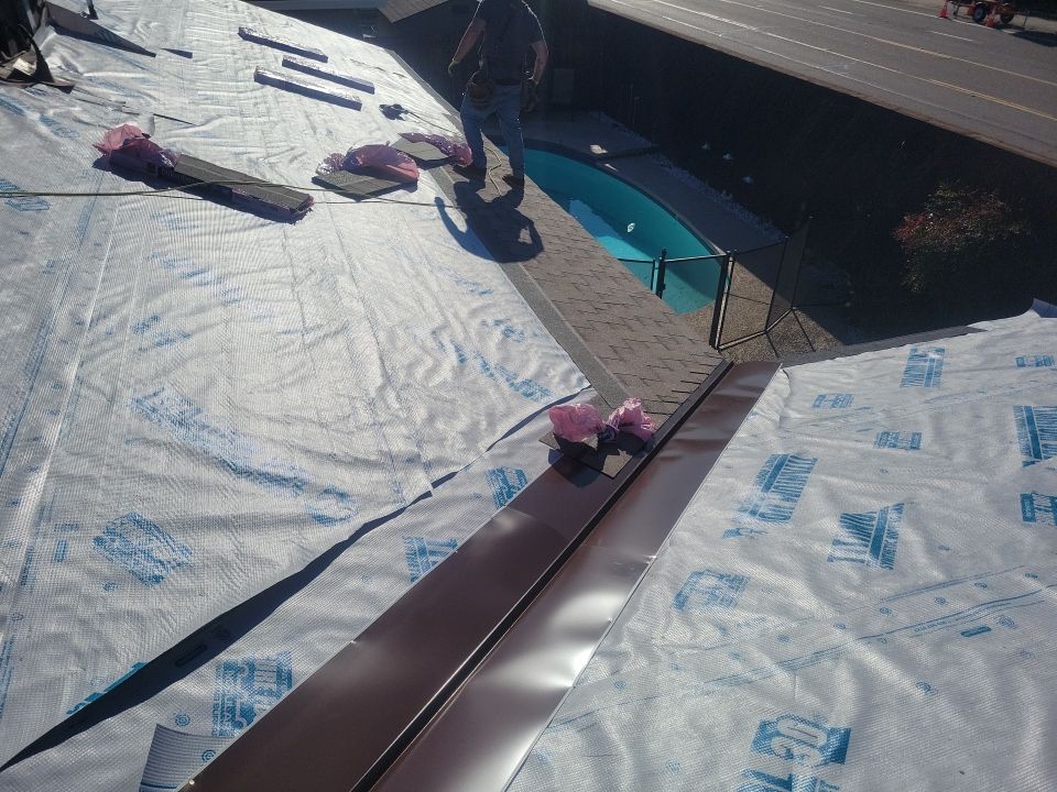 Roofing and Gutters to protect this home by Byers Enterprises