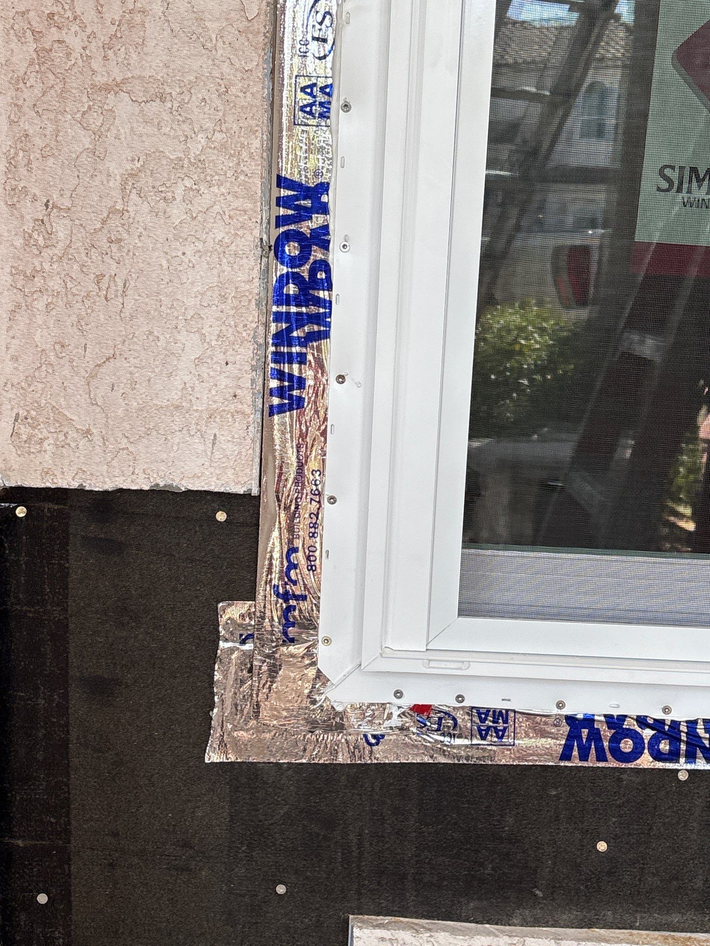 Installing Windows on a Submarine  by Bayfront Roofing and Construction