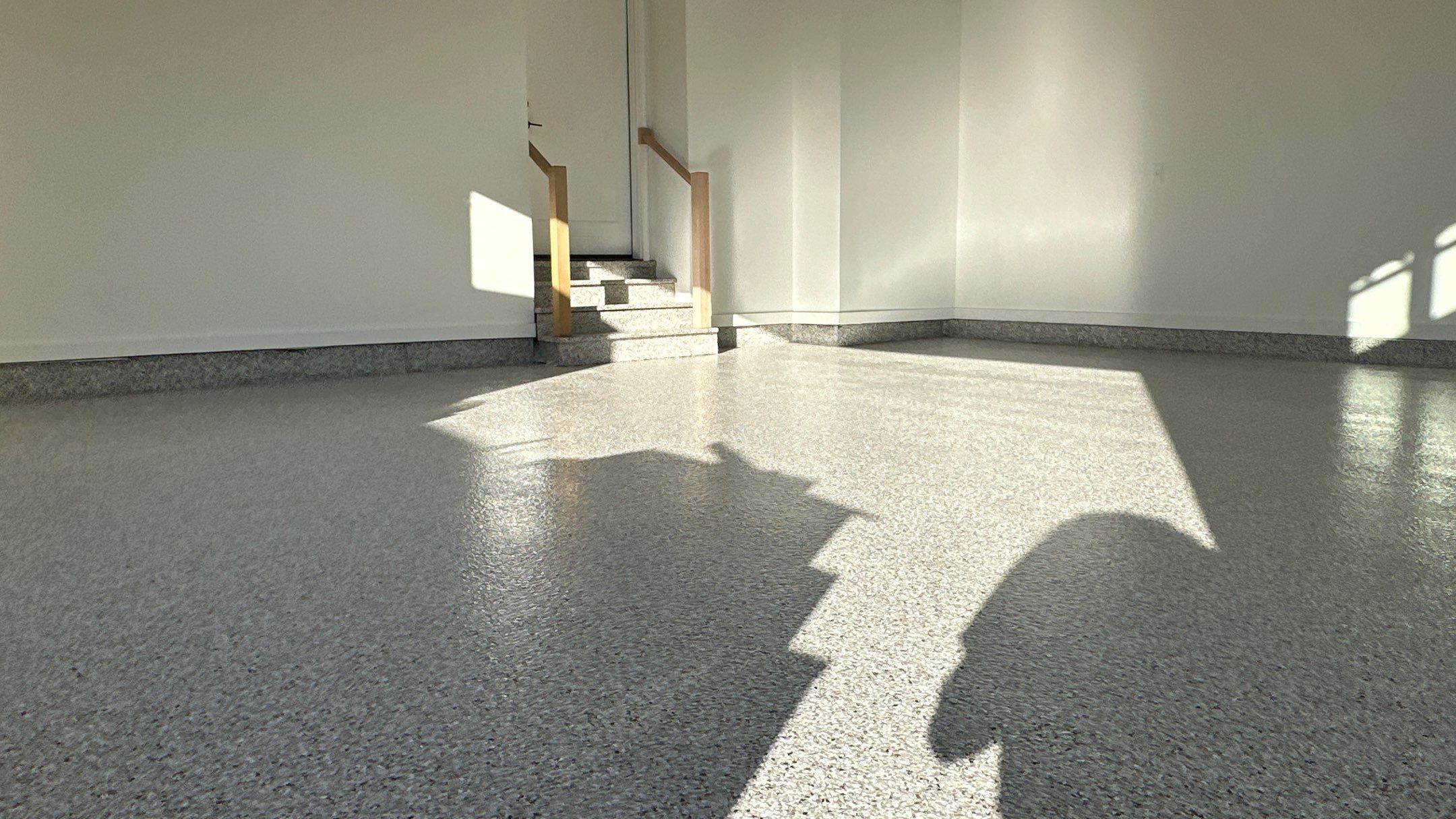 Mike M. got him self a beautiful Coyote flake floor by Banner Garage