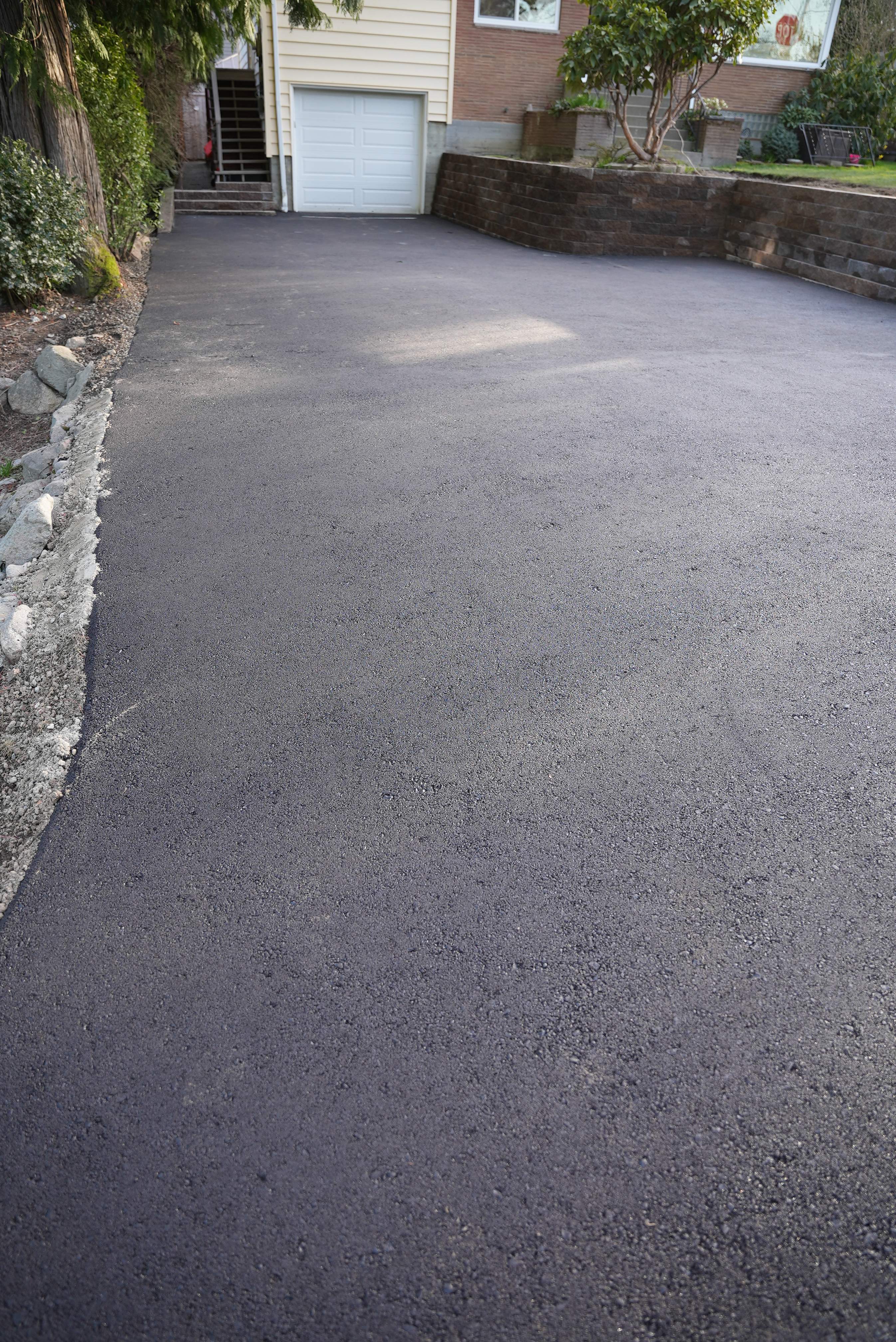 Lorra | Asphalt Driveway Repair & Retaining Wall by Jireh Asphalt & Concrete Inc 