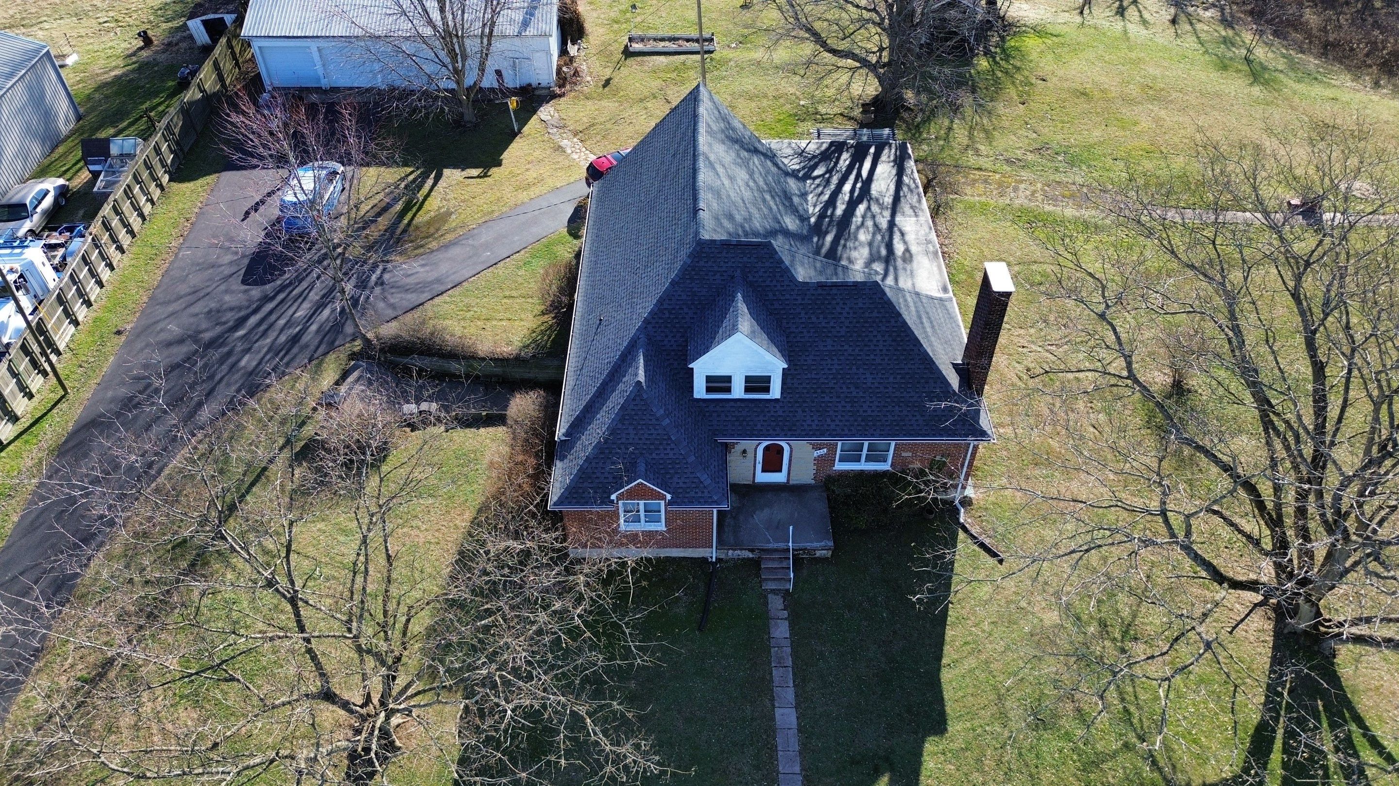 Residential Roofing Installation using Timberline HDZ Shingles - Pewter Gray by RoofX 