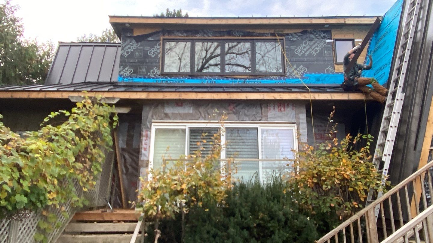 Residential Roofing Installation using 16" Standing Seam Panels by Jay Carter Roofing & Sheet Metal