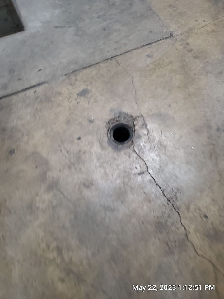 Parking garage using Hot water by Northern Power Washing LLC.