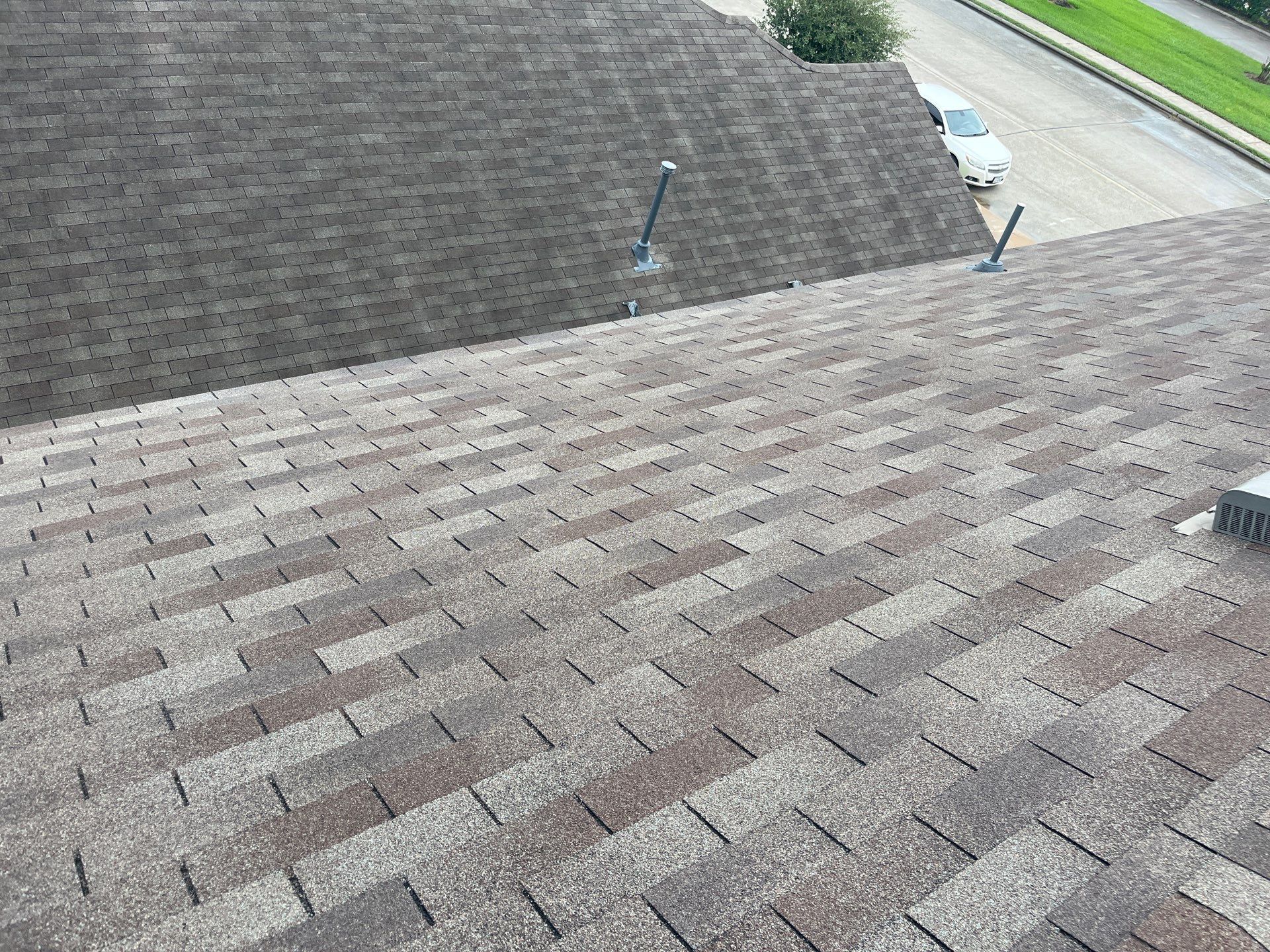 Hail Damage using Owen's Corning Duration (Lifetime) Shingles by Roof Repair Company