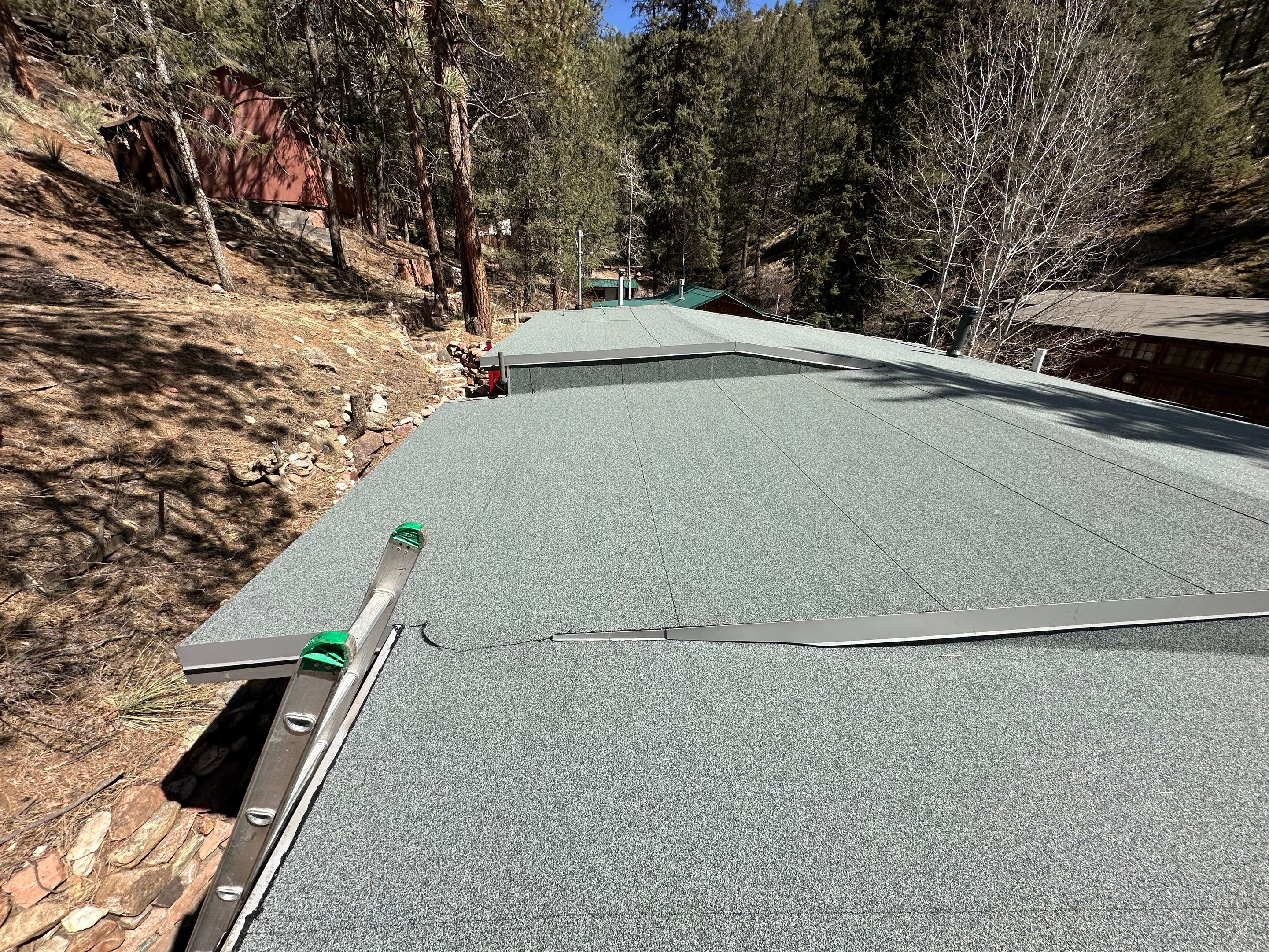 Residential Roofing Installation using Modified Bitumen Roofing by Blue Peaks Roofing LLC 
