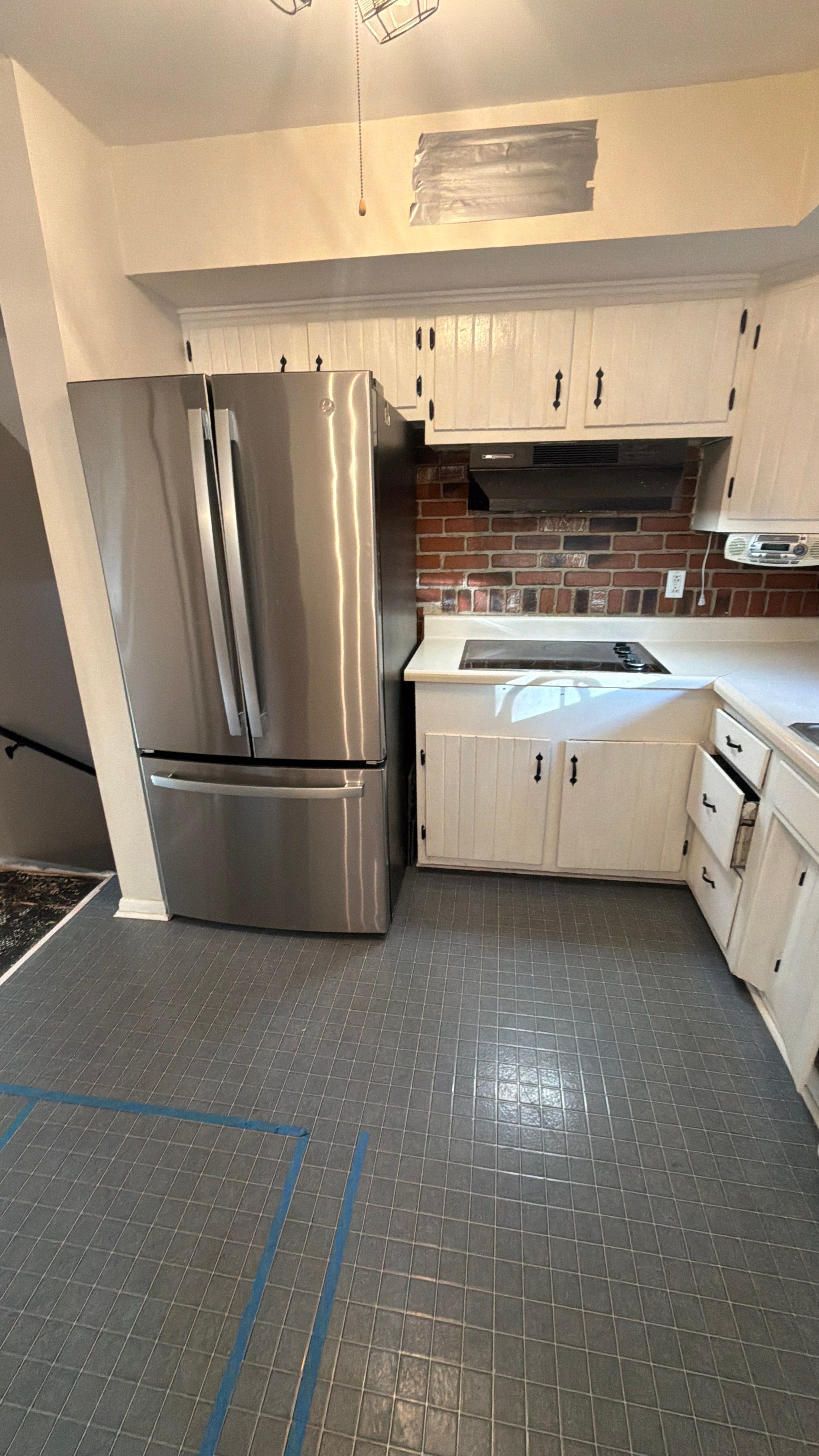 Phoenixville Kitchen Remodel with White Shaker Cabinets and Green Backsplash by Reliable General Contracting