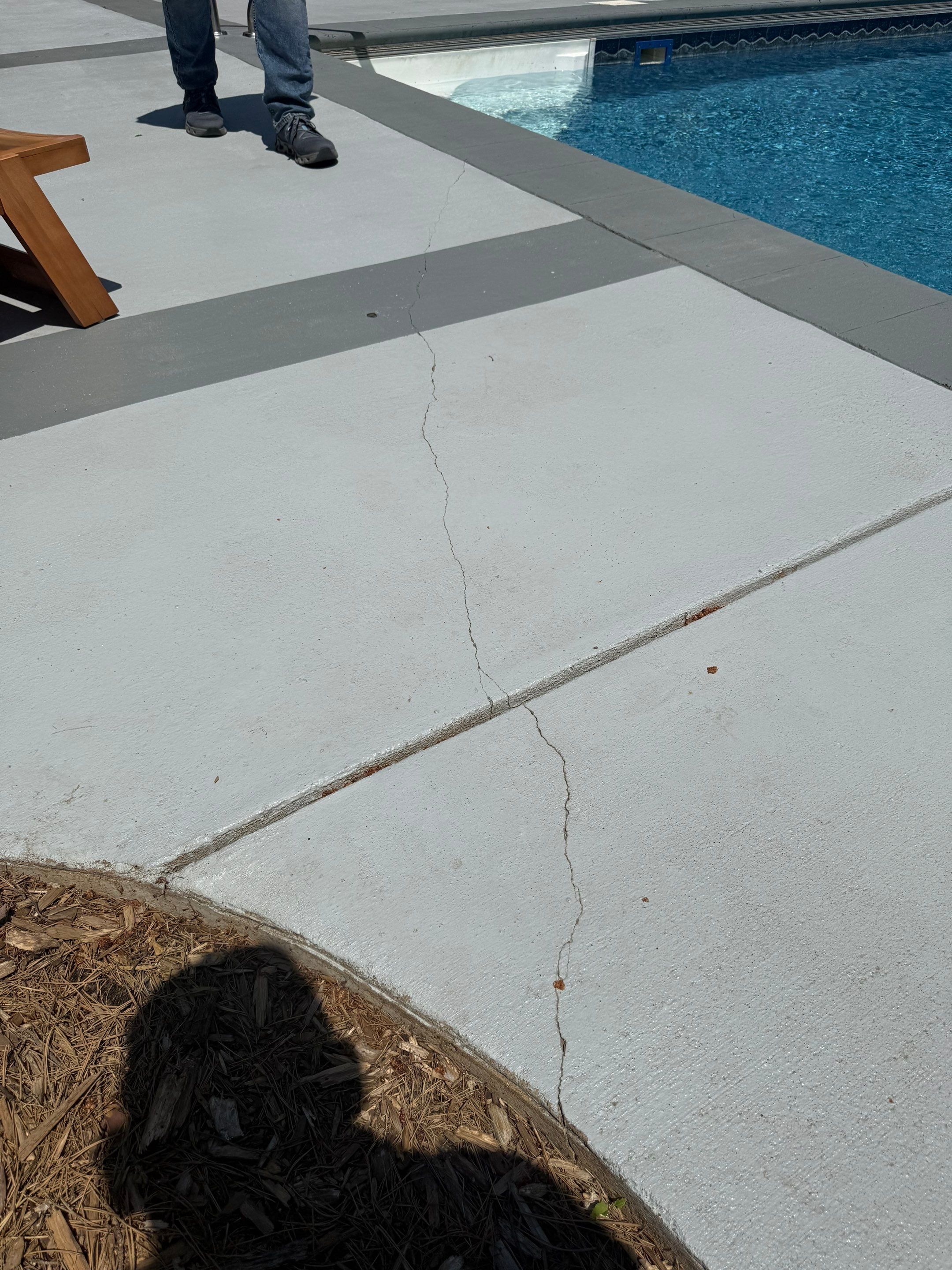 Decorative Concrete Pool Deck and Patio Resurfacing in Sioux Falls by Select Painting, Coatings & Garage Cabinets