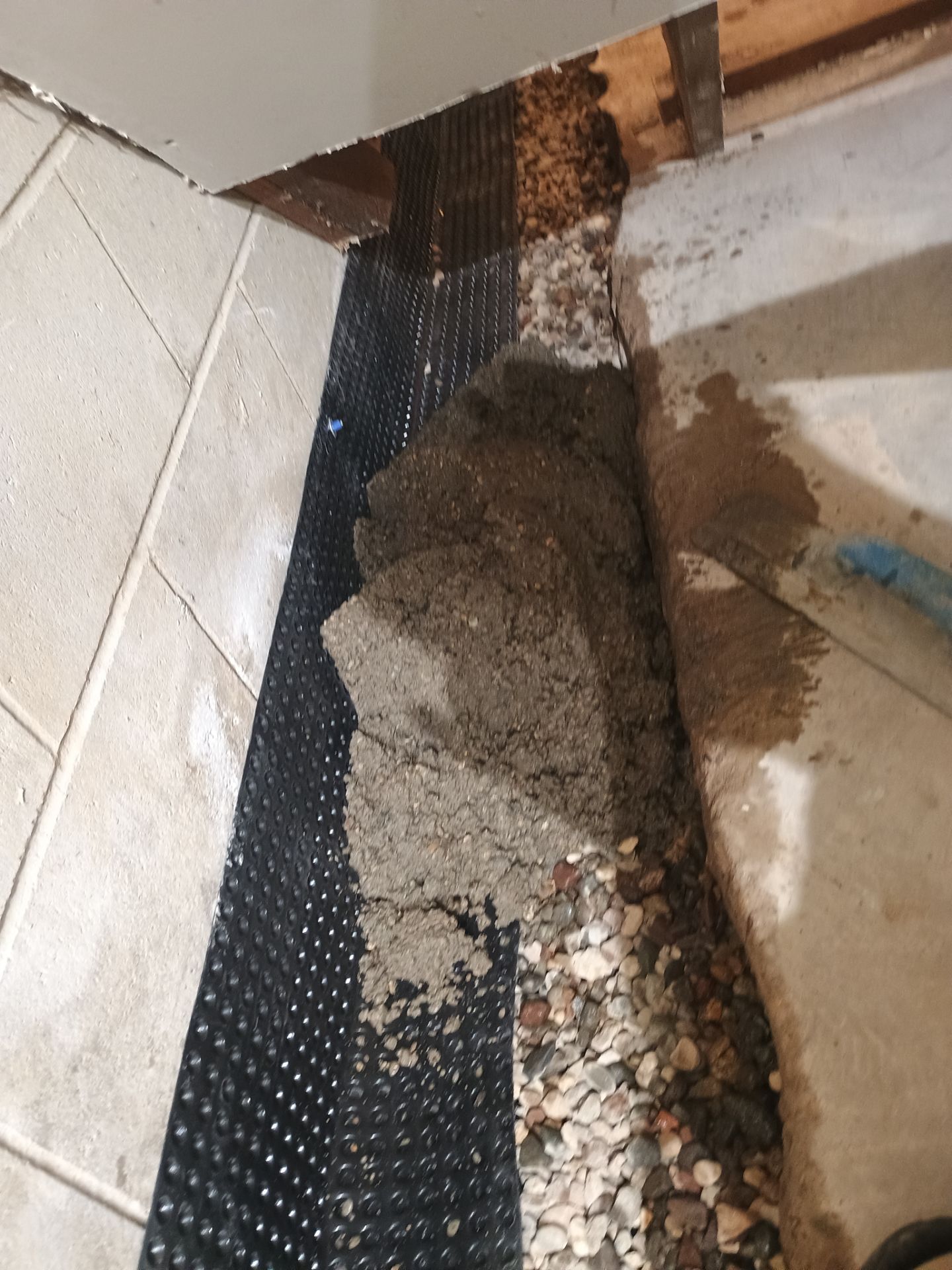 Interior Drain Tile Installation in Minnetonka, MN by Waterproofing Northeast