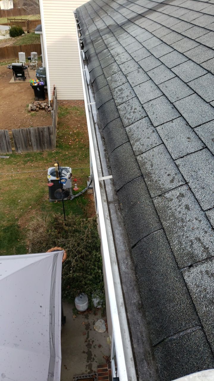 gutters and Driveway by Power Wash Masters LLC