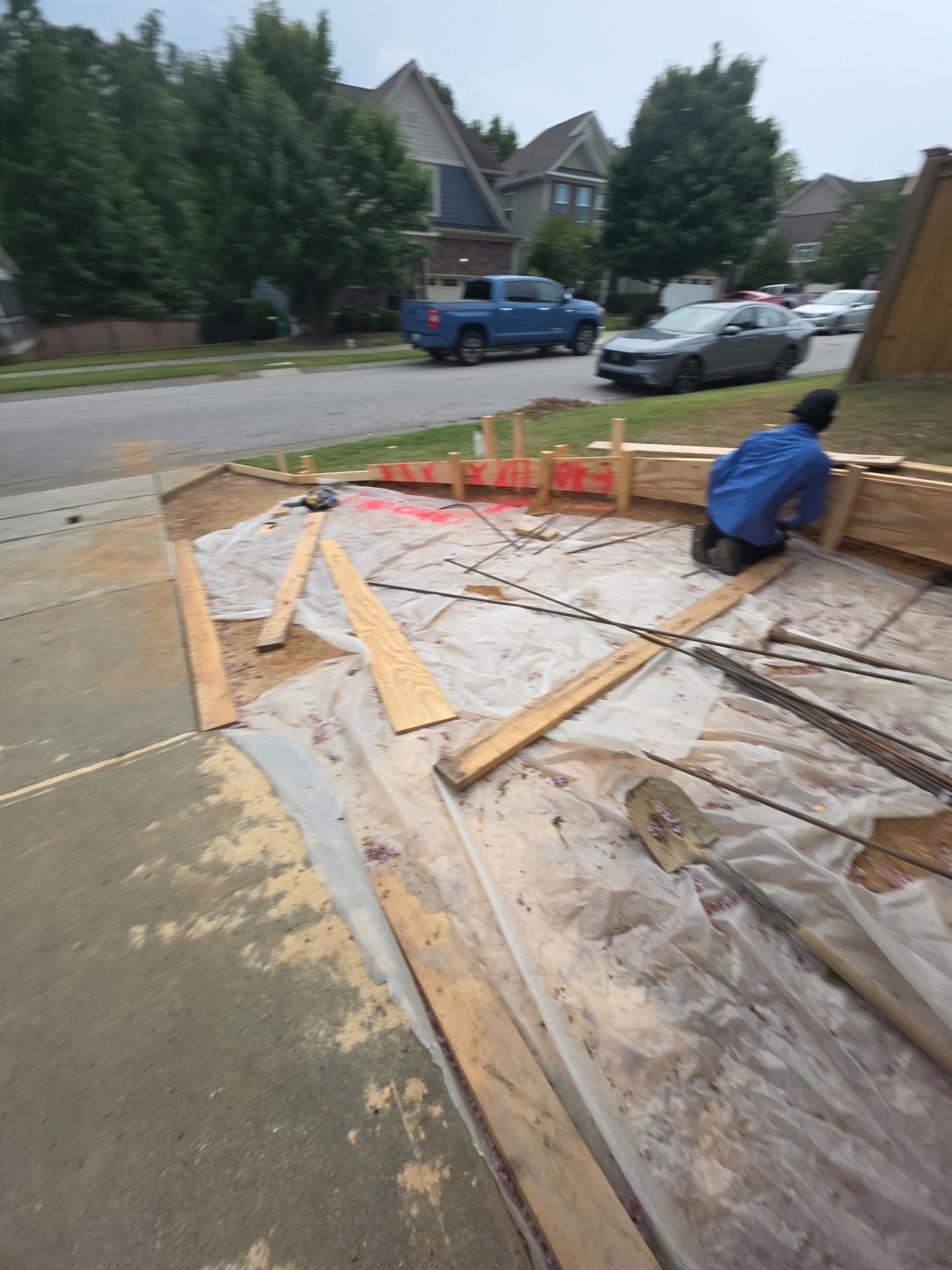 Concrete Driveway Expansion & Retaining Wall | Apex, NC by Elite Remodeling and Design LLC