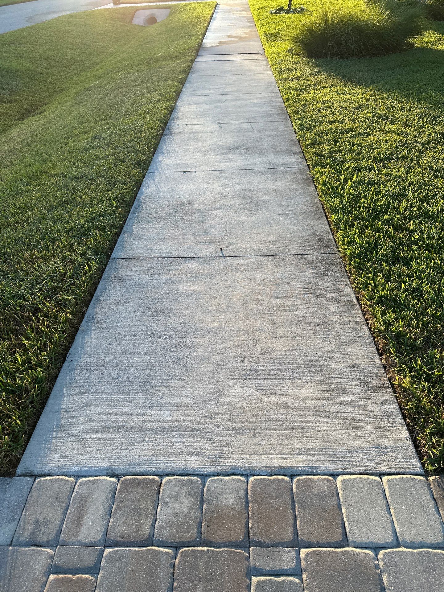 Paver Driveway, Sidewalk, and Pool Deck Cleaning in Winding River Community, Bradenton, FL by Sunshine AquaWash