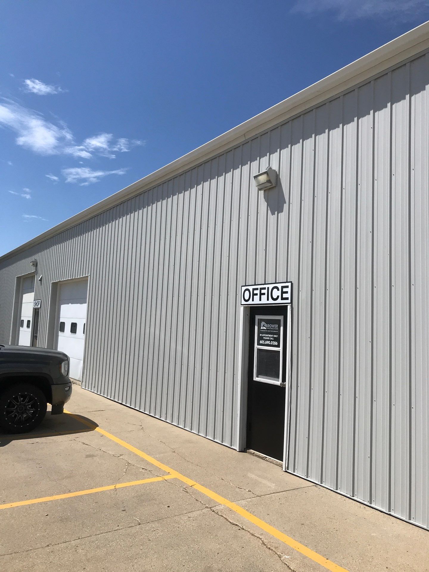 Commercial Shop Renovation and Concrete Parking Installation in Brookings by Select Painting, Coatings & Garage Cabinets