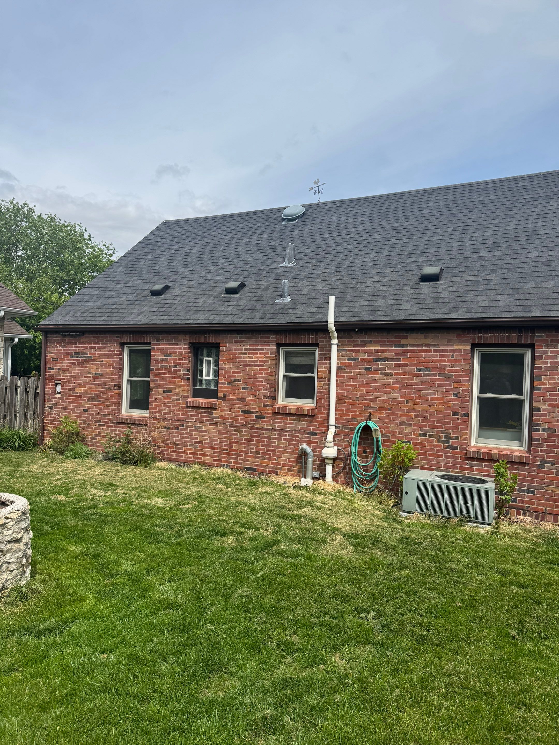 IKO Roof and Seamless Gutters by Lightning Exteriors