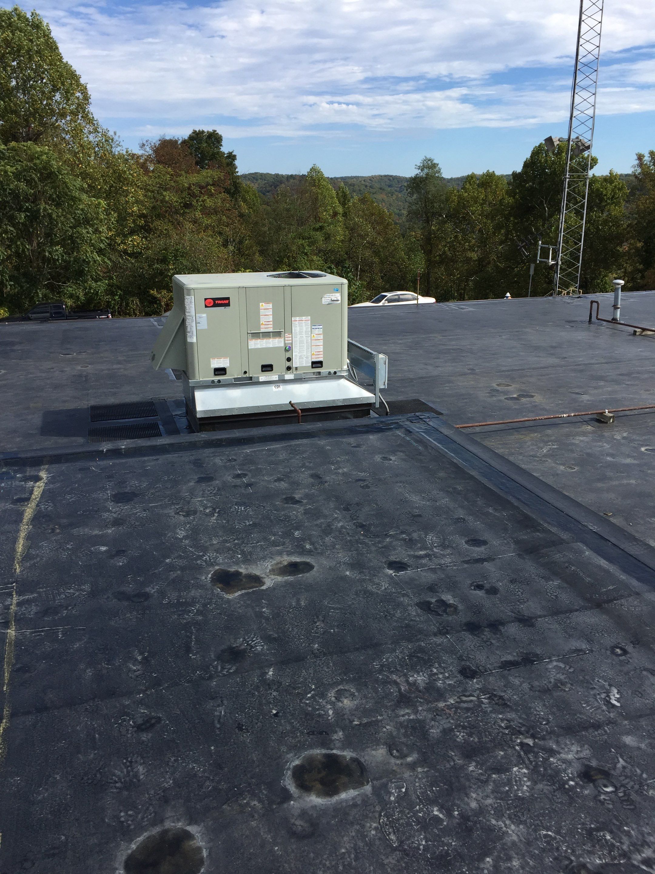 Commercial Rubber Roofing  using Carlisle Rubber Roofing System by Secure Construction Company Inc