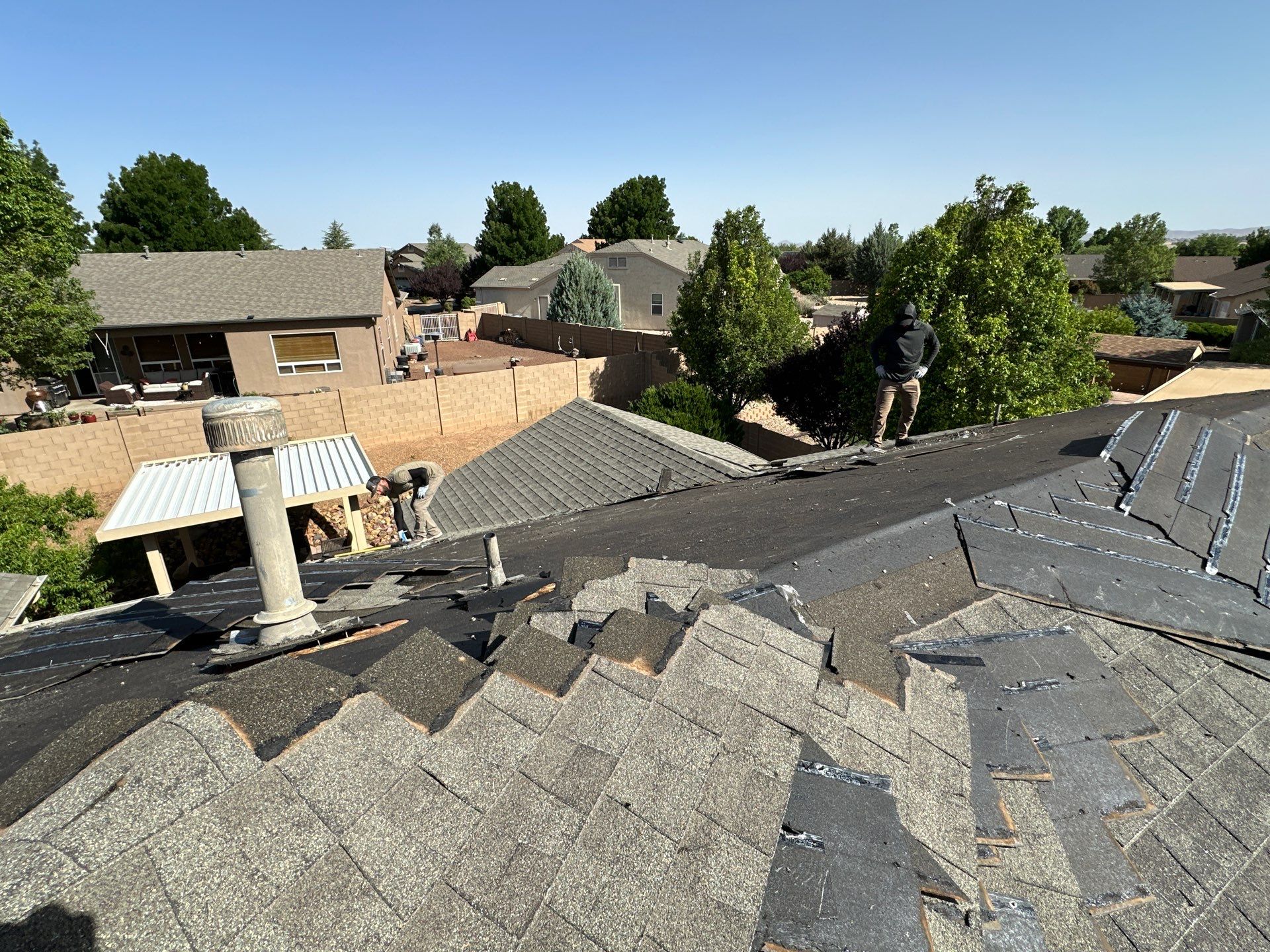 Residential Roofing Installation with Architectural Shingles and Turret Detail by Badger Roofing