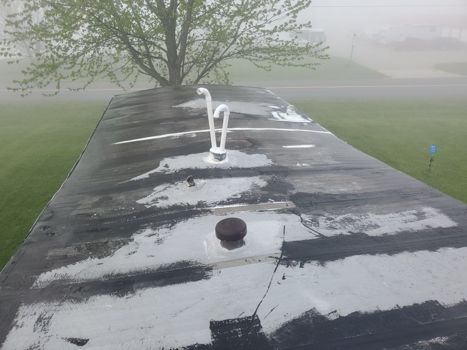 Residential Roofing Installation using 60 mil rubber roof  by Nitro Roofing and Construction