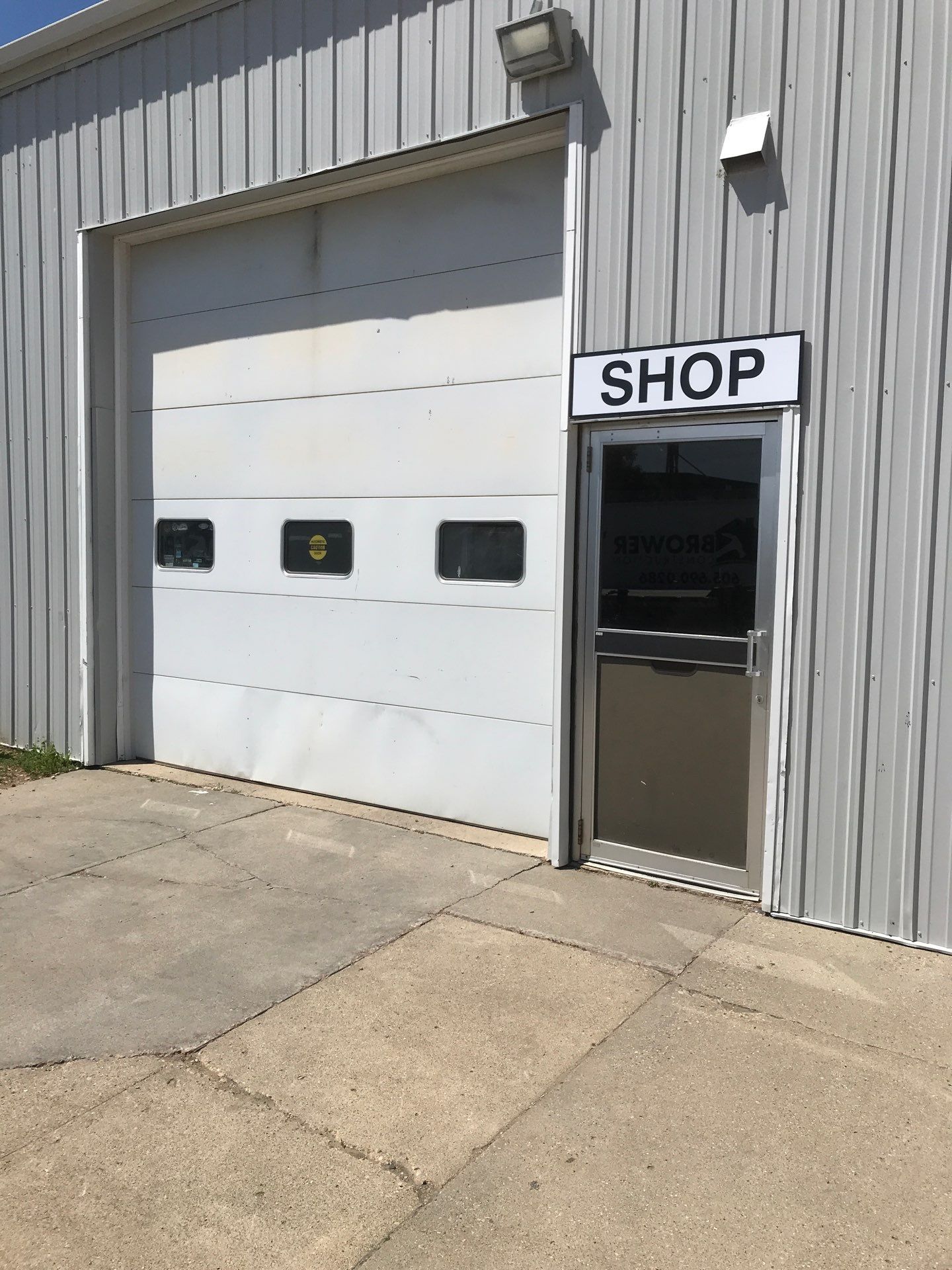 Commercial Shop Renovation and Concrete Parking Installation in Brookings by Select Painting, Coatings & Garage Cabinets