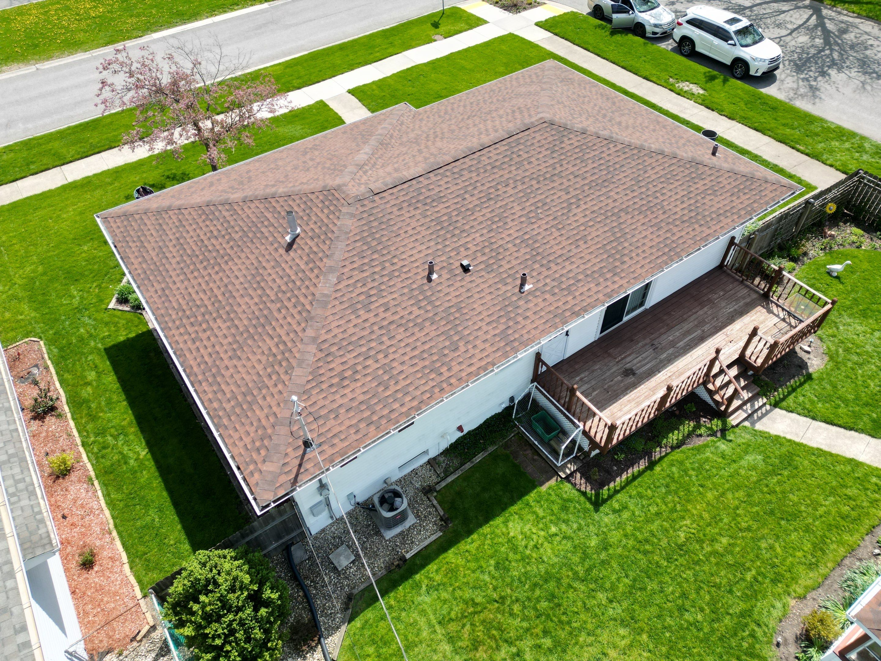 House and garage roof replacement by Optimal Home Improvement 