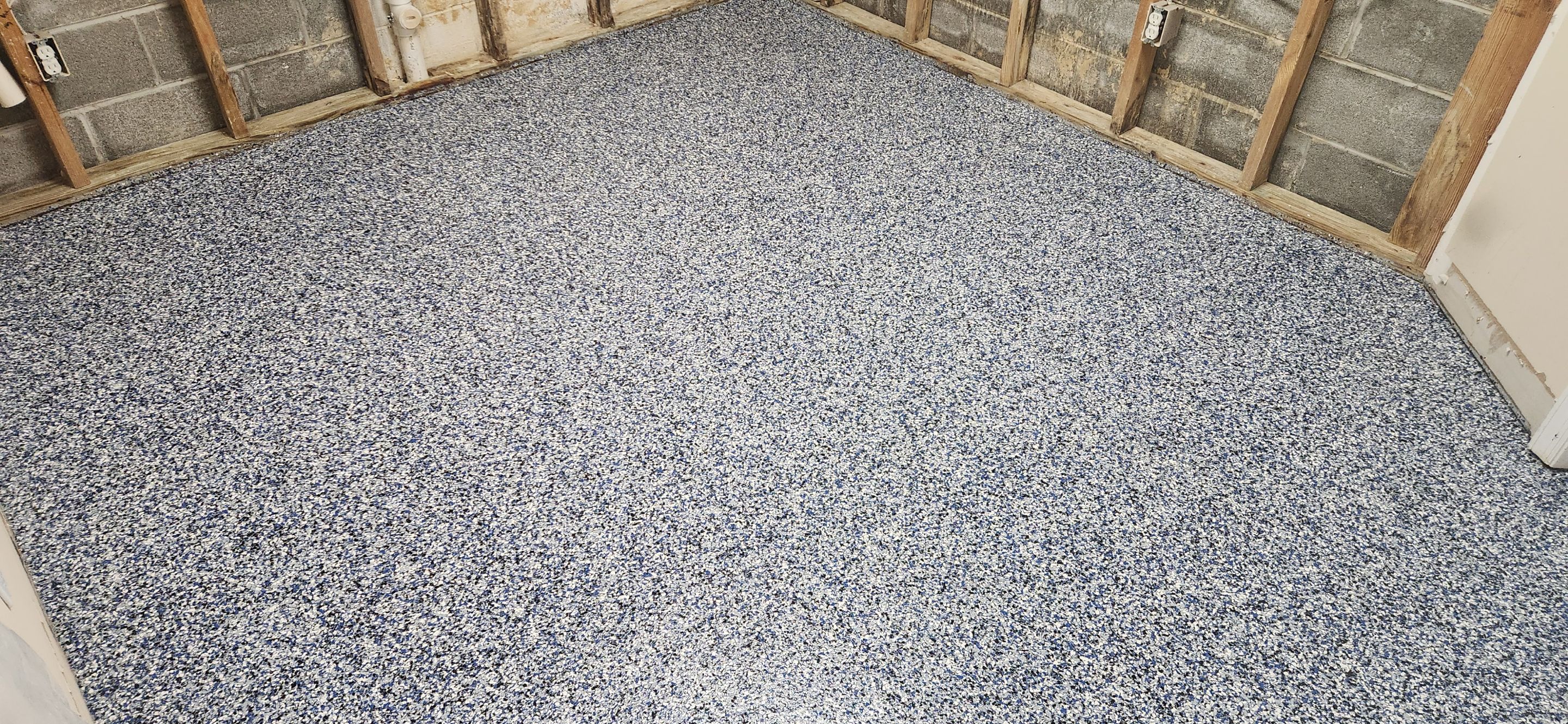 Basement using Denim by Elite Floor Solutions