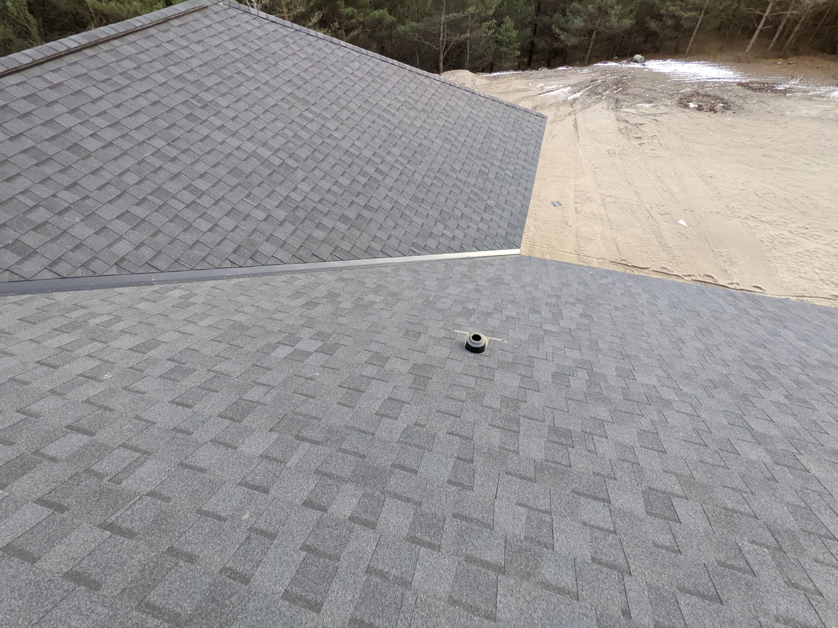 New Home Construction using 16" Standing Seam Panels, & Shingles  by Jay Carter Roofing & Sheet Metal