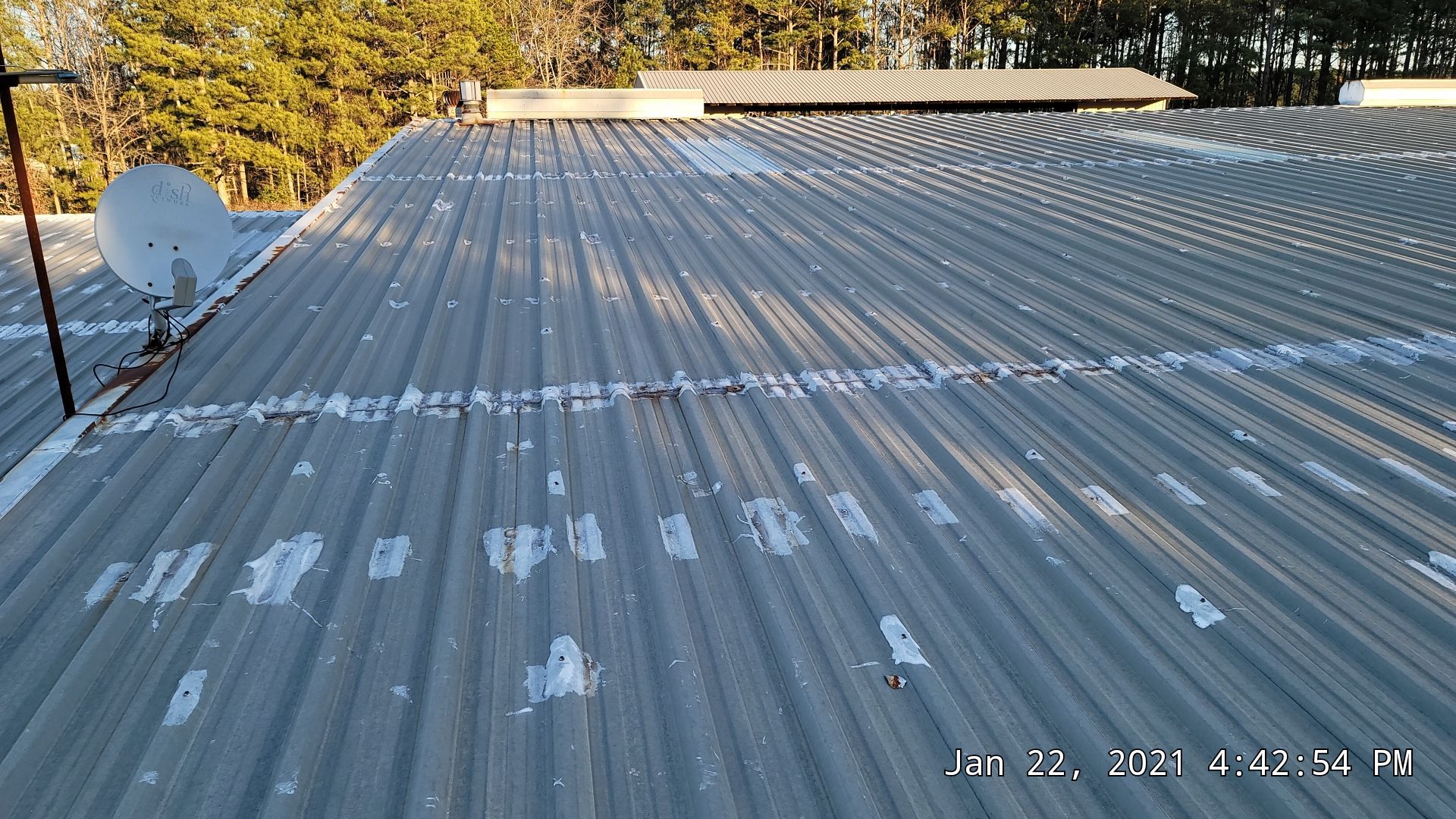 Commercial Roofing Installation using Aldocoat Coatings by Hostetler Roofing