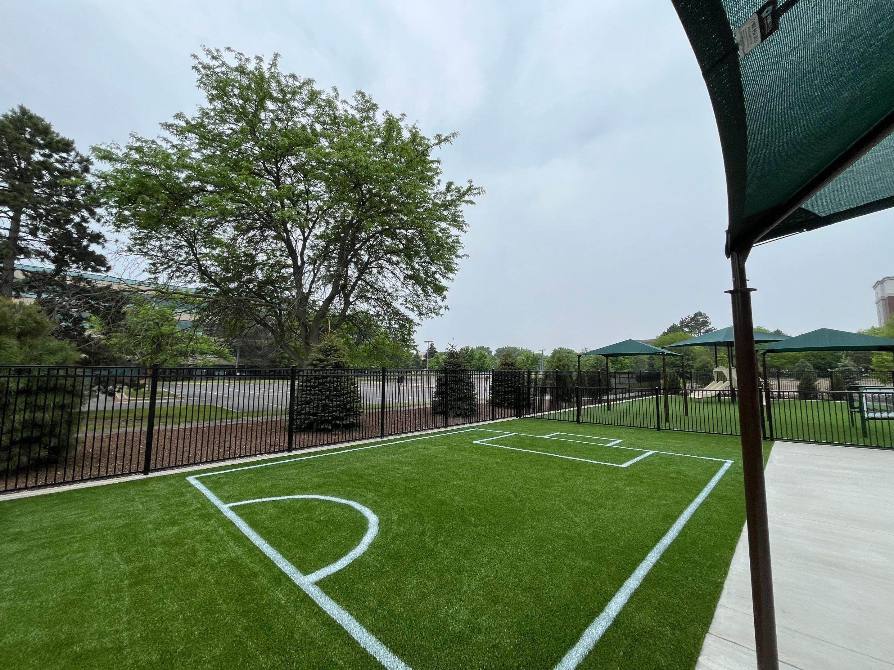 KinderCare of Lincolnshire Commercial Playground Turf Installation by Southwest Greens Midwest
