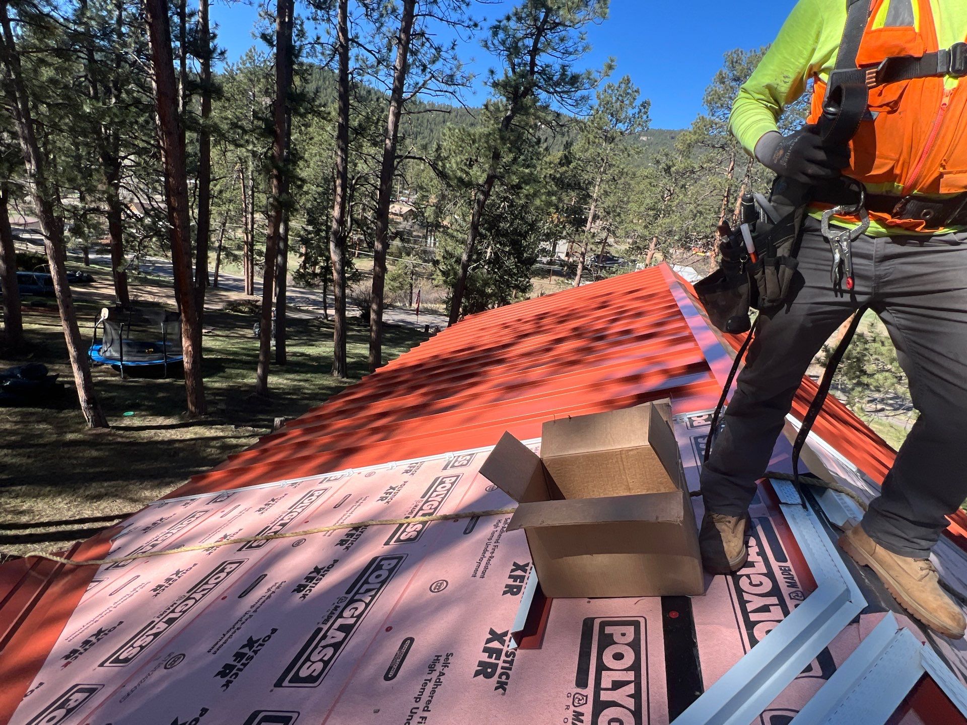 Residential Roofing Installation using Standing Seam Metal by Blue Peaks Roofing LLC 