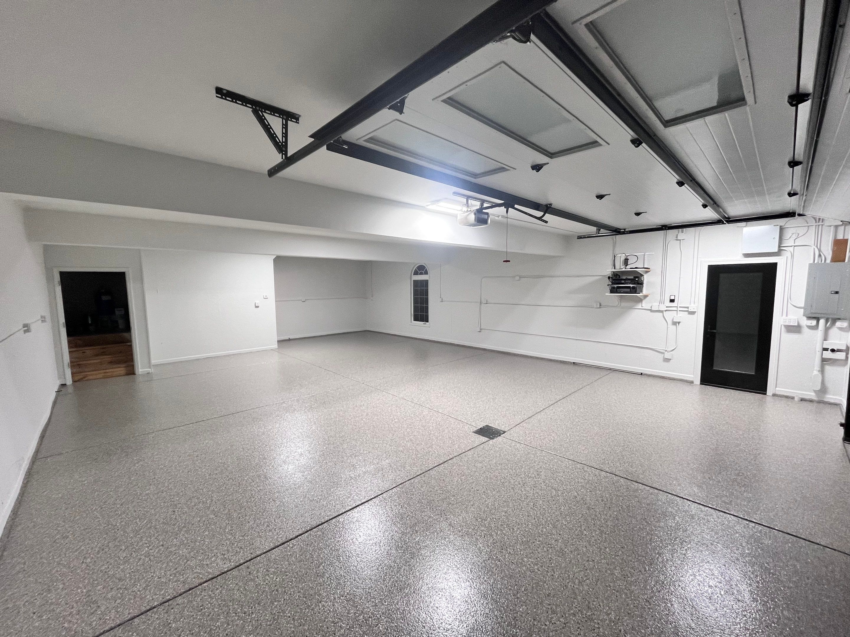Creekbed Flake Garage Floor  by Level 10 Coatings