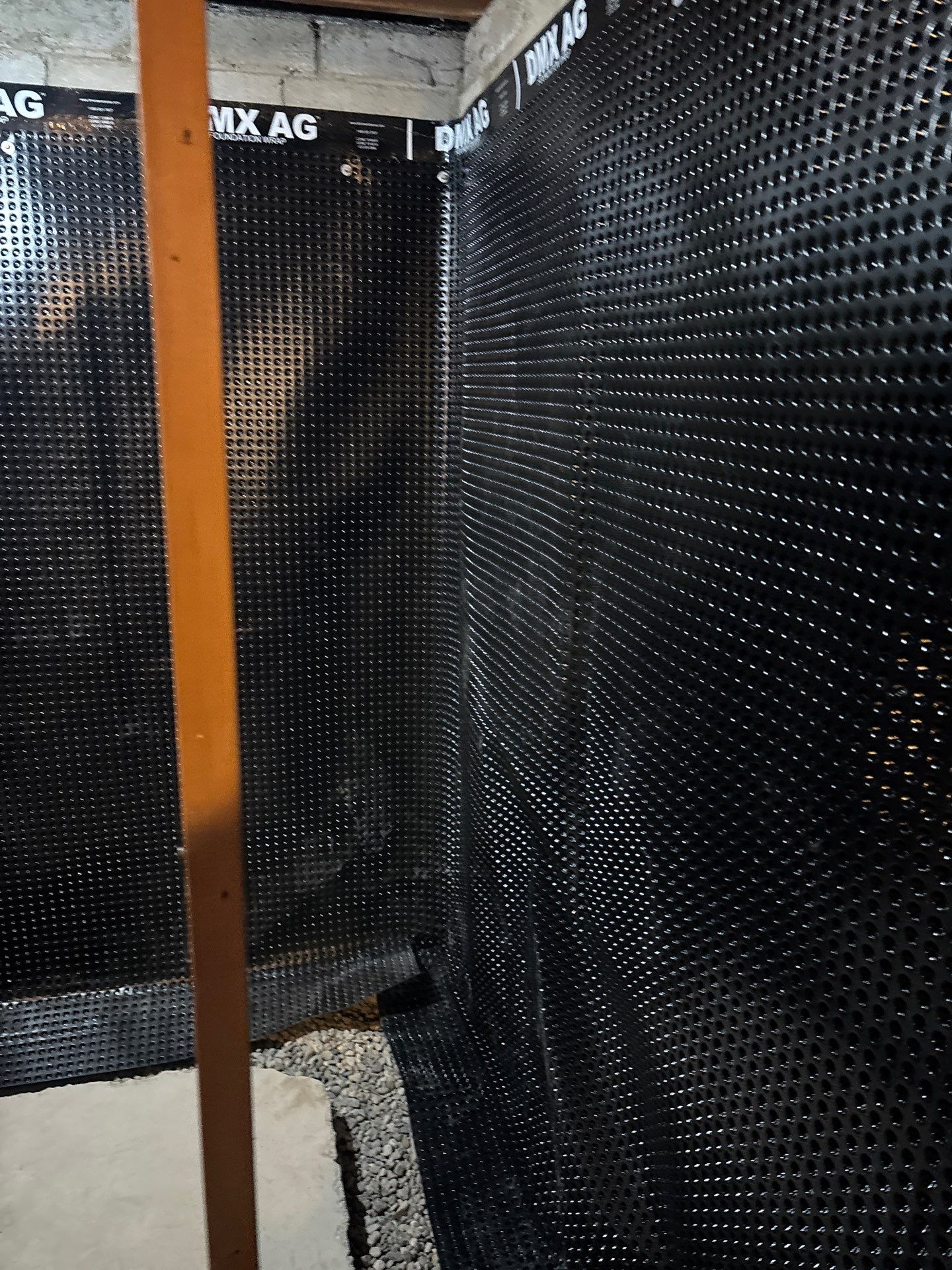 Interior Drain Tile & Buried Discharge in South Minneapolis by Waterproofing Northeast