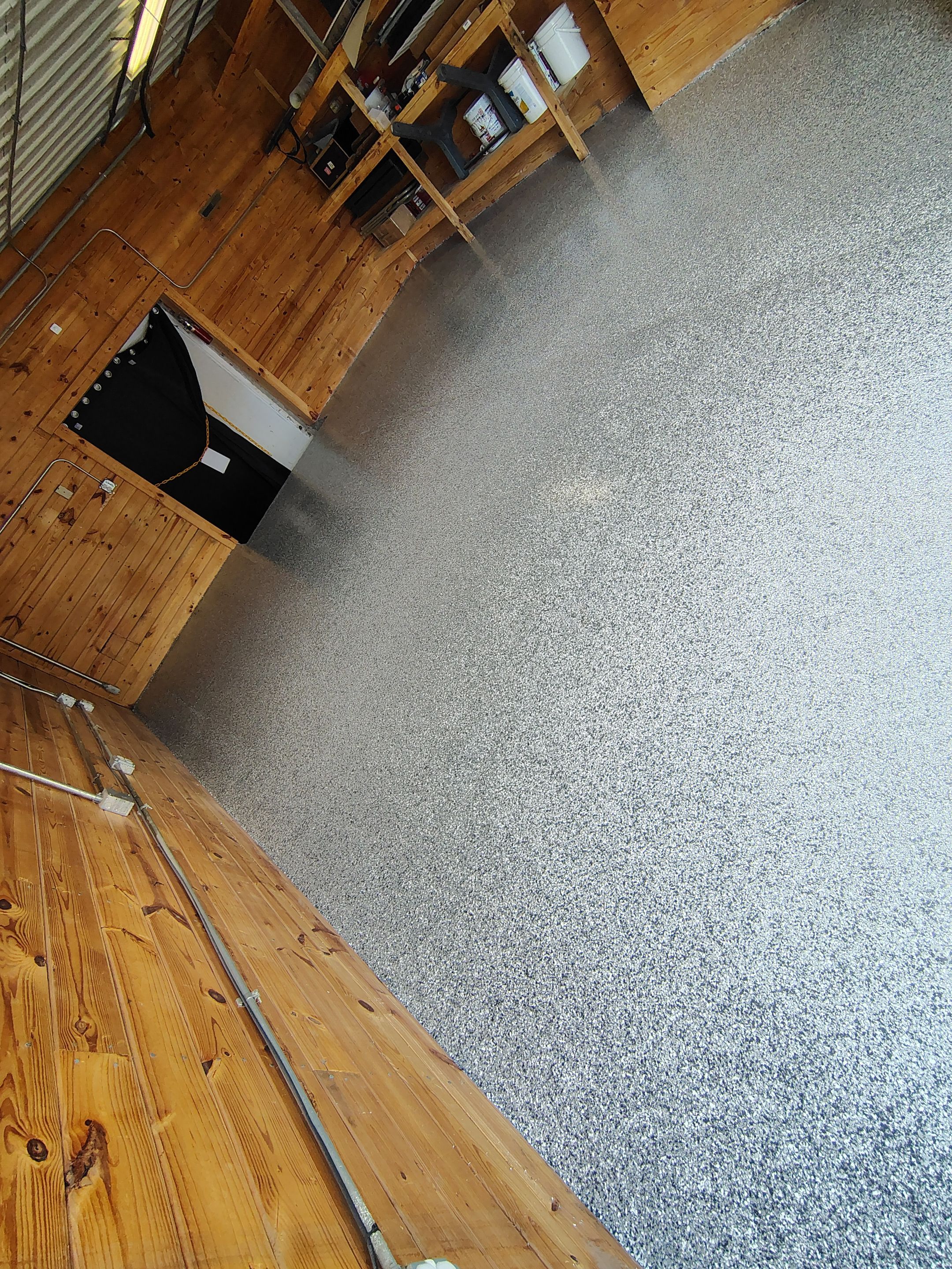 Commercial Epoxy Flake Floor Coating in Emmetsburg, Iowa by Select Painting, Coatings & Garage Cabinets