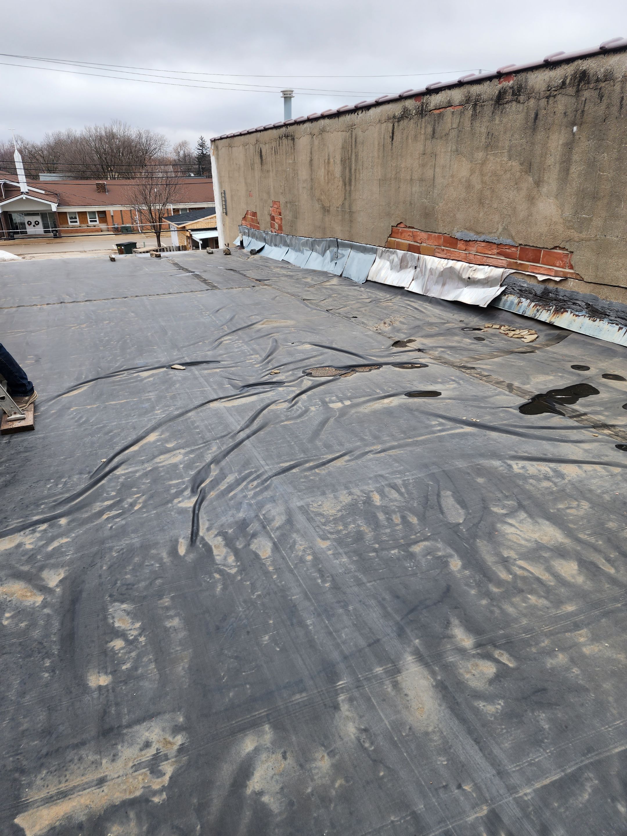Roof Recover on a downtown building in Lake City  by Grell Roofing, LLC