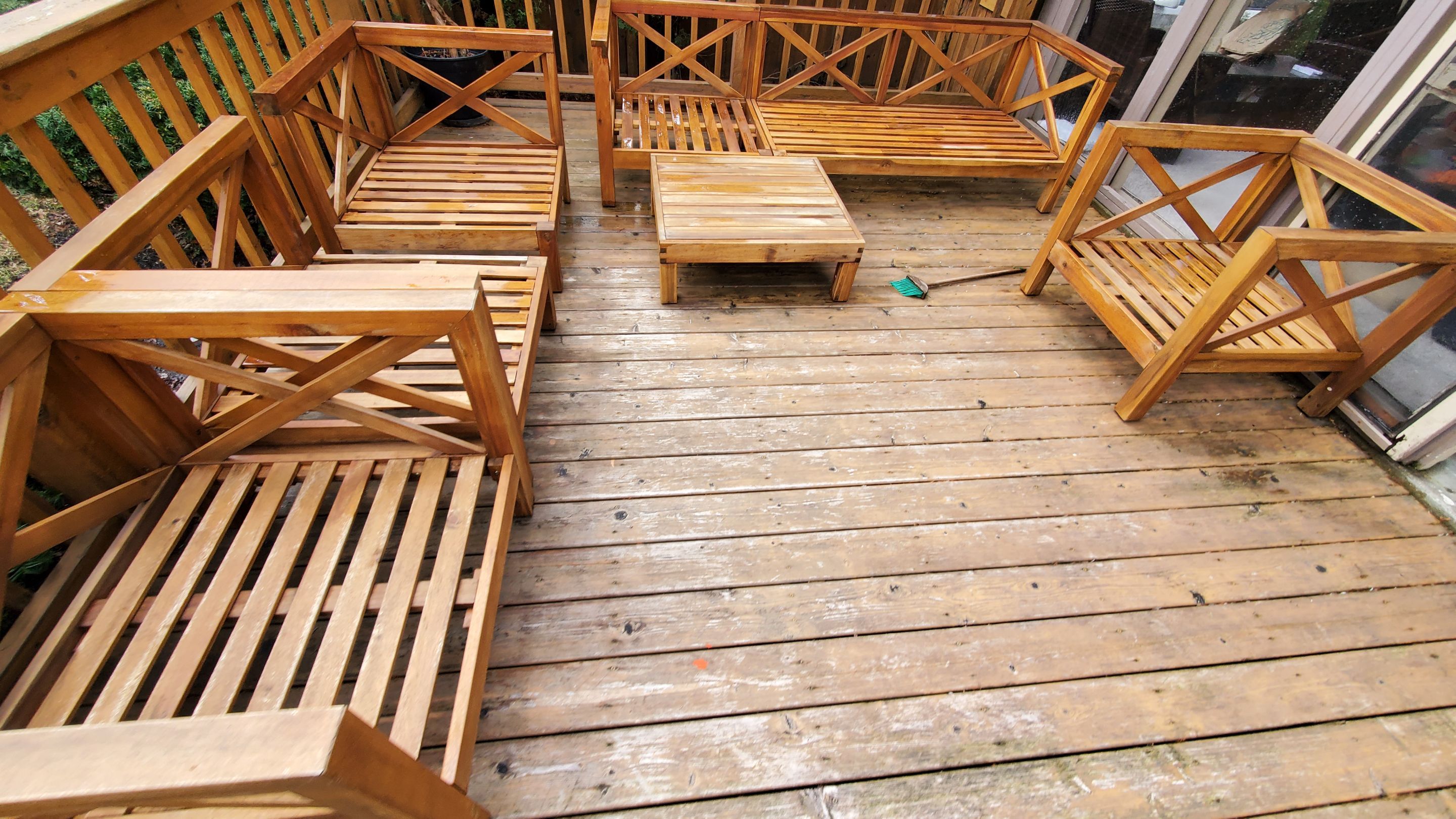Wood cleaning and staining using Armstrong cloark oil stain by Northern Power Washing LLC.