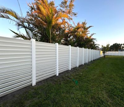 Louvered Vinyl Privacy Fence - White