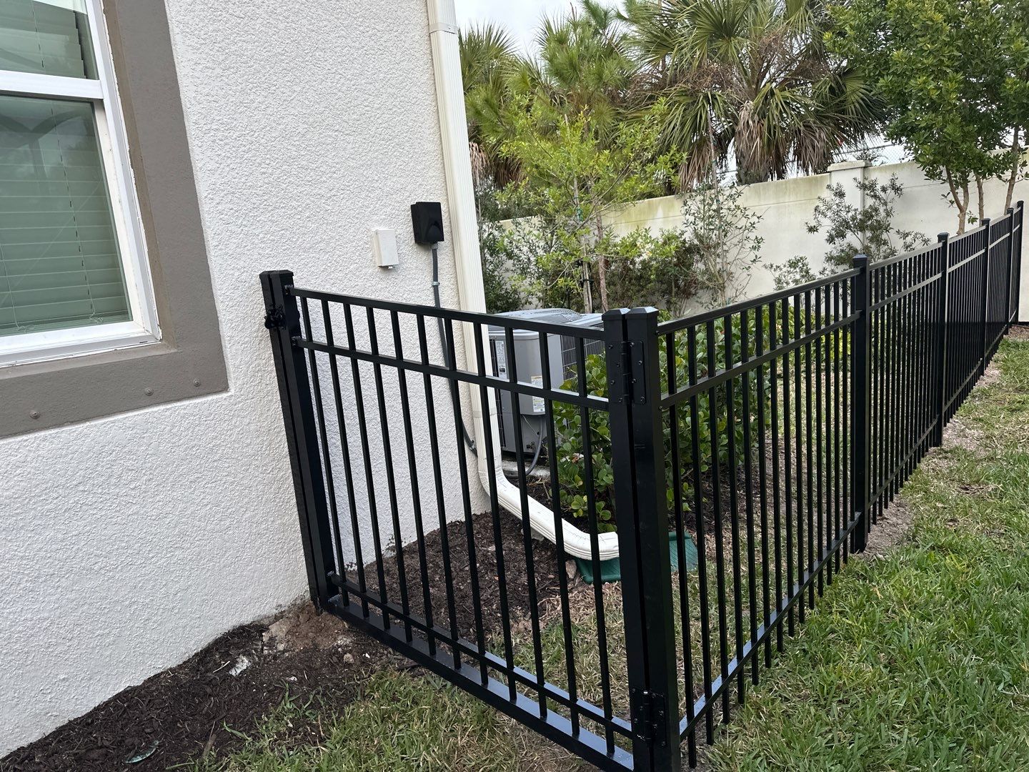 Aluminum Fence Installation using Black 3 Rail Aluminum Fence by Asap fence and gates, LLC