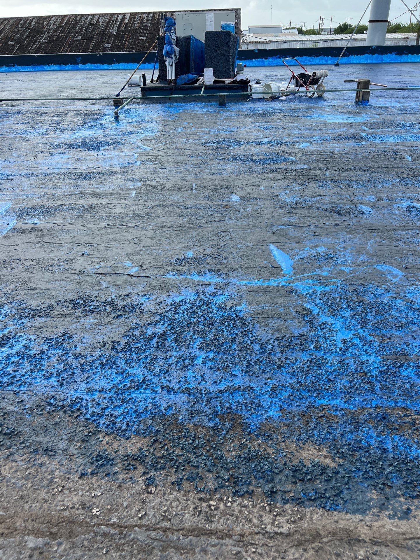 Dirty leaking Gravel Roof by Bayfront Roofing and Construction